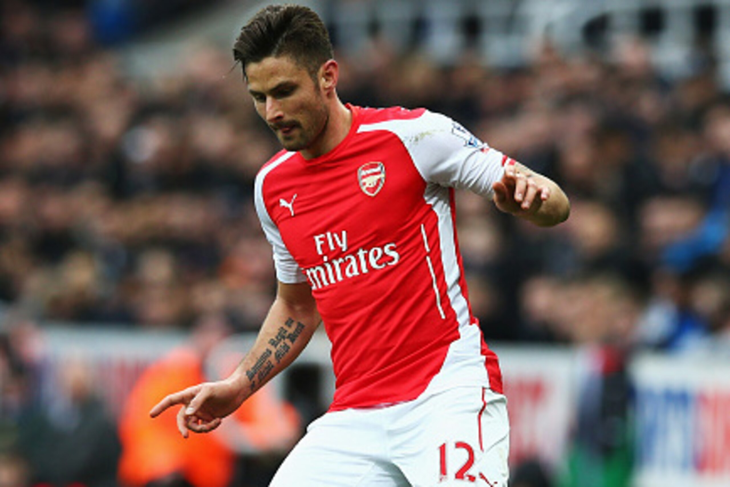 NEWCASTLE UPON TYNE, ENGLAND - MARCH 21: Olivier Giroud of Arsenal in action during the Barclays Premier League match between Newcastle United and Arsenal at St James' Park on March 21, 2015 in Newcastle upon Tyne, England. (Photo by Matthew Lewis/Getty NEWCASTLE UPON TYNE, ENGLAND - MARCH 21: Olivier Giroud of Arsenal in action during the Barclays Premier League match between Newcastle United and Arsenal at St James' Park on March 21, 2015 in Newcastle upon Tyne, England. (Photo by Matthew Lewis/Getty