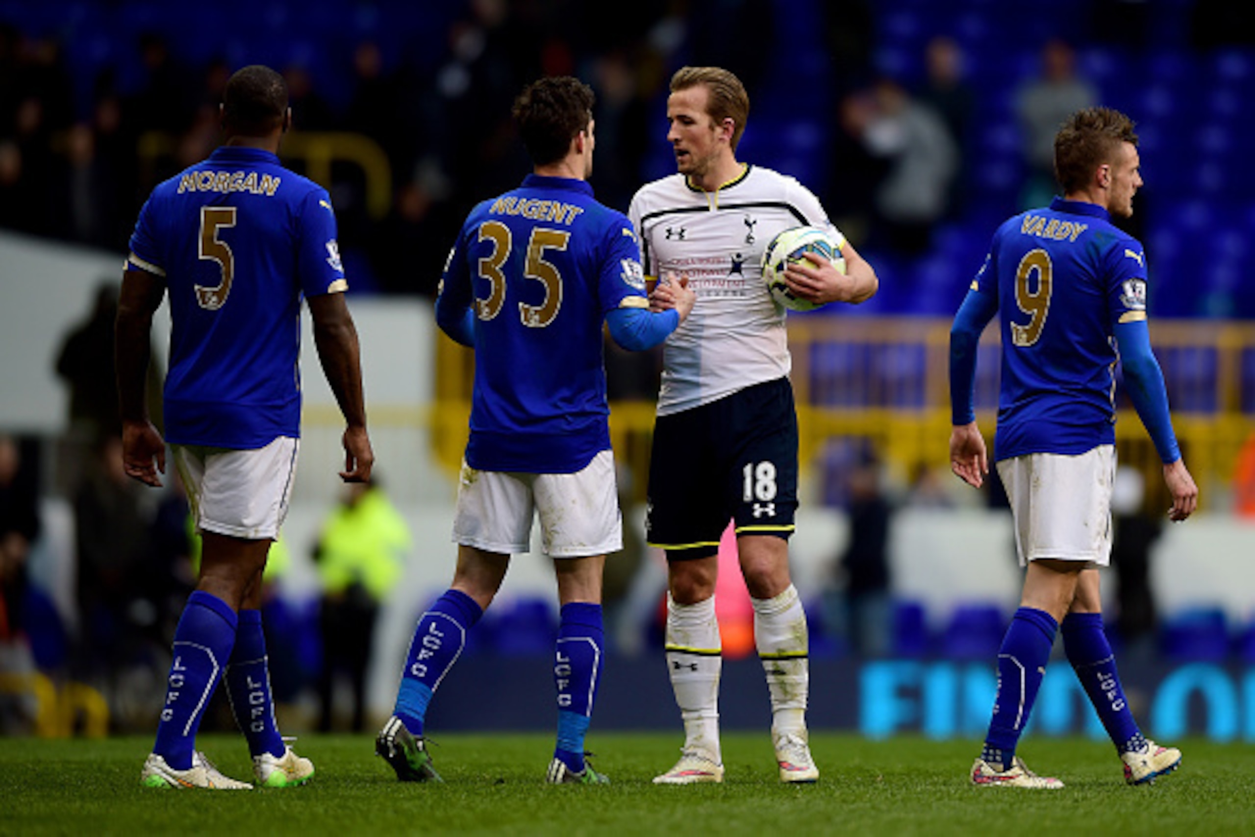 LONDON, ENGLAND - MARCH 21: Harry Kane of Spurs is congratulated by David Nugent of Leicester City after collecting the match ball following his hat-trick during the Barclays Premier League match between Tottenham Hotspur and Leicester City at White Hart LONDON, ENGLAND - MARCH 21: Harry Kane of Spurs is congratulated by David Nugent of Leicester City after collecting the match ball following his hat-trick during the Barclays Premier League match between Tottenham Hotspur and Leicester City at White Hart