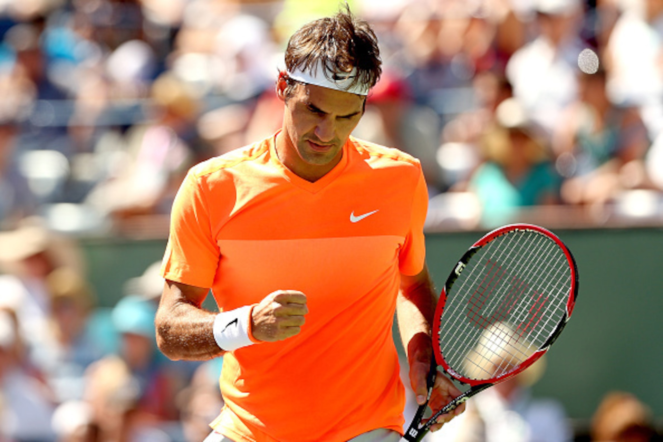 INDIAN WELLS, CA - MARCH 21:  Roger Federer of Switzerland celebrates a point against Milos Roanic of Canada during the semifinals on day thirteen of the BNP Paribas Open at the Indian Wells Tennis Garden on March 21, 2015 in Indian Wells, California.  (P