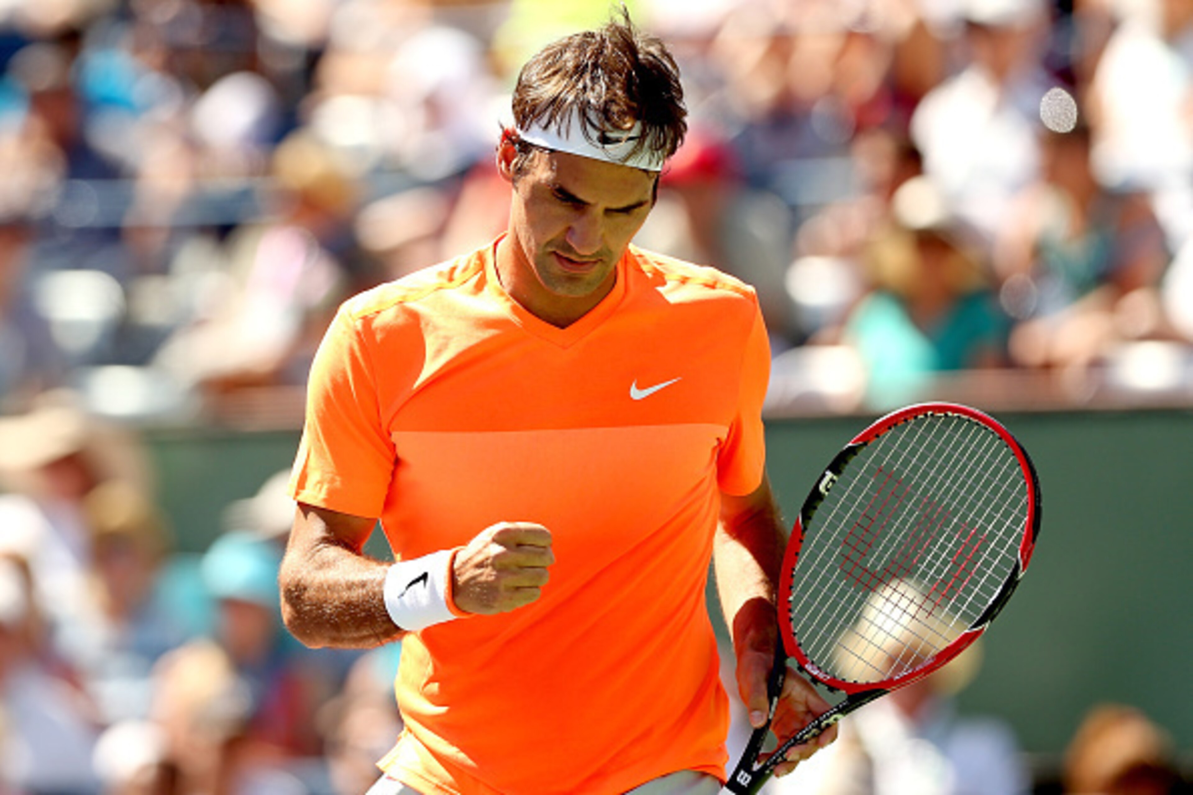 INDIAN WELLS, CA - MARCH 21:  Roger Federer of Switzerland celebrates a point against Milos Roanic of Canada during the semifinals on day thirteen of the BNP Paribas Open at the Indian Wells Tennis Garden on March 21, 2015 in Indian Wells, California.  (P
