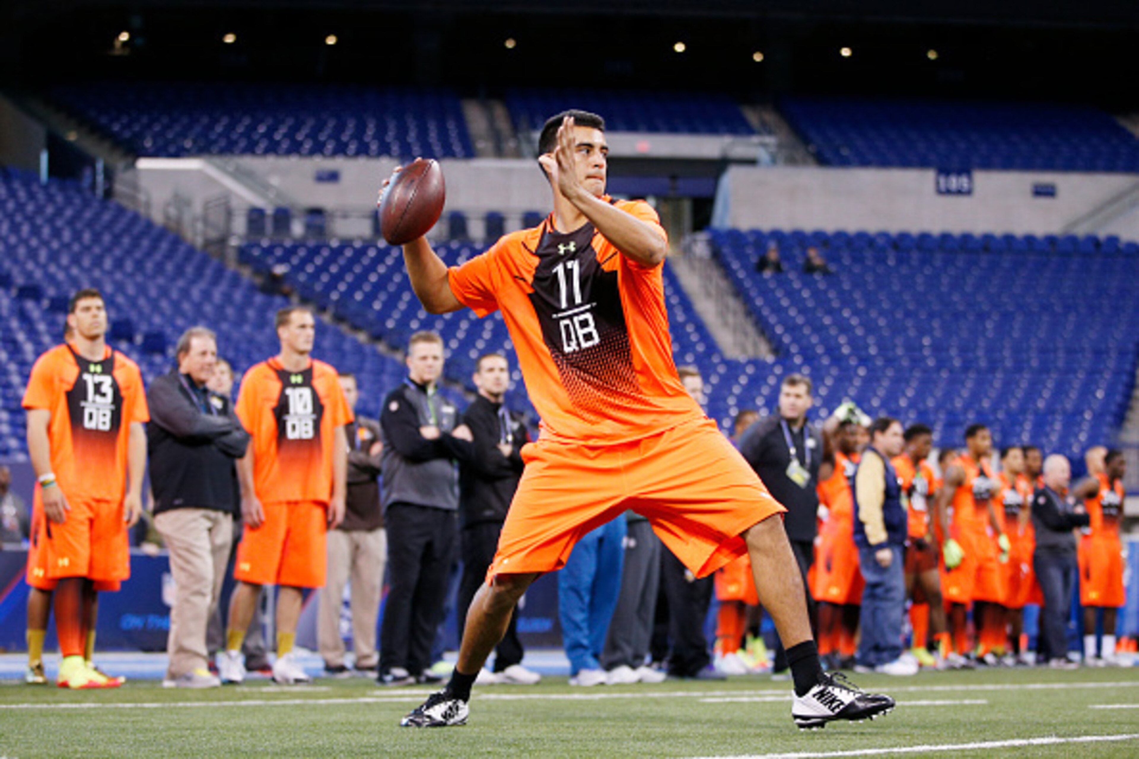 INDIANAPOLIS, IN - FEBRUARY 21: Quarterback Marcus Mariota of Oregon throws a pass during the 2015 NFL Scouting Combine at Lucas Oil Stadium on February 21, 2015 in Indianapolis, Indiana. (Photo by Joe Robbins/Getty Images) INDIANAPOLIS, IN - FEBRUARY 21: Quarterback Marcus Mariota of Oregon throws a pass during the 2015 NFL Scouting Combine at Lucas Oil Stadium on February 21, 2015 in Indianapolis, Indiana. (Photo by Joe Robbins/Getty Images)