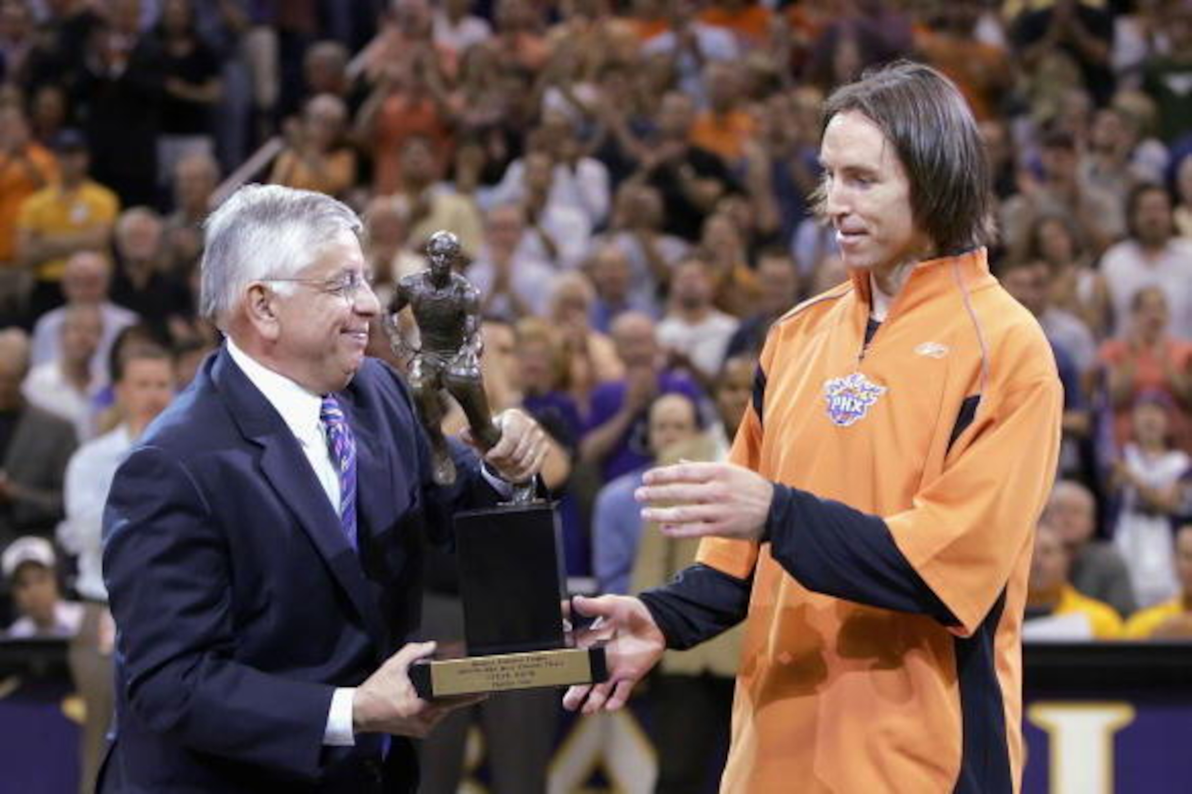 PHOENIX - MAY 8: Commissioner David Stern presents Steve Nash of the Phoenix Suns with the Most Valuable Player trophy before game one of the Western Conference Semifinals against the Los Angeles Clippers during the 2006 NBA Playoffs on May 8, 2006 at U PHOENIX - MAY 8: Commissioner David Stern presents Steve Nash of the Phoenix Suns with the Most Valuable Player trophy before game one of the Western Conference Semifinals against the Los Angeles Clippers during the 2006 NBA Playoffs on May 8, 2006 at U