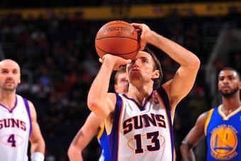 PHOENIX, AZ - FEBRUARY 10: Steve Nash #13 of the Phoenix Suns  shoots a free throw against the Golden State Warriors on February 10, 2011 at U.S. Airways Center in Phoenix, Arizona. NOTE TO USER: User expressly acknowledges and agrees that, by downloading