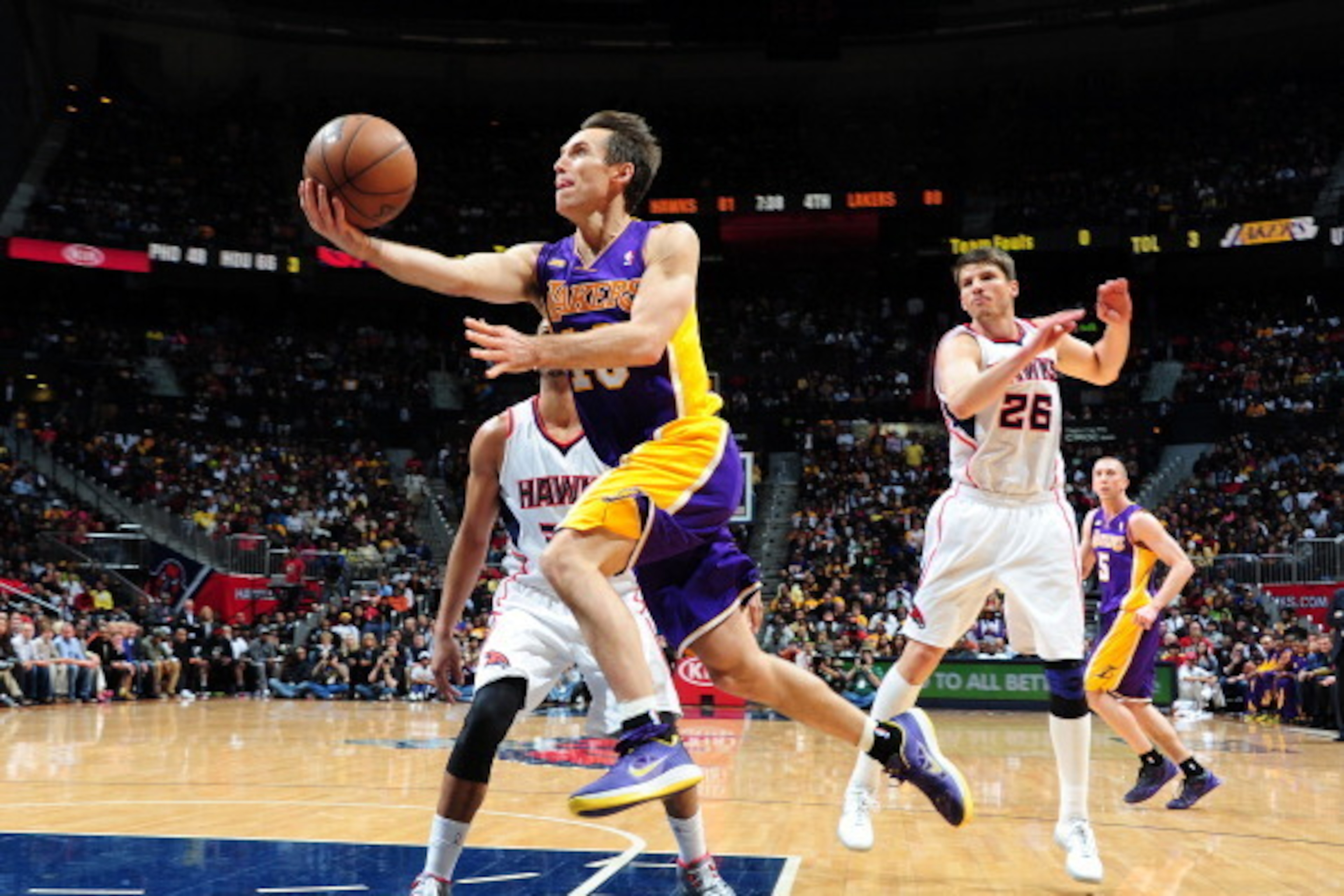 ATLANTA, GA - MARCH 13: Steve Nash #10 of the Los Angeles Lakers is quick to the basket for the layup against the Atlanta Hawks on March 13, 2013 at Philips Arena in Atlanta, Georgia. NOTE TO USER: User expressly acknowledges and agrees that, by download ATLANTA, GA - MARCH 13: Steve Nash #10 of the Los Angeles Lakers is quick to the basket for the layup against the Atlanta Hawks on March 13, 2013 at Philips Arena in Atlanta, Georgia. NOTE TO USER: User expressly acknowledges and agrees that, by download