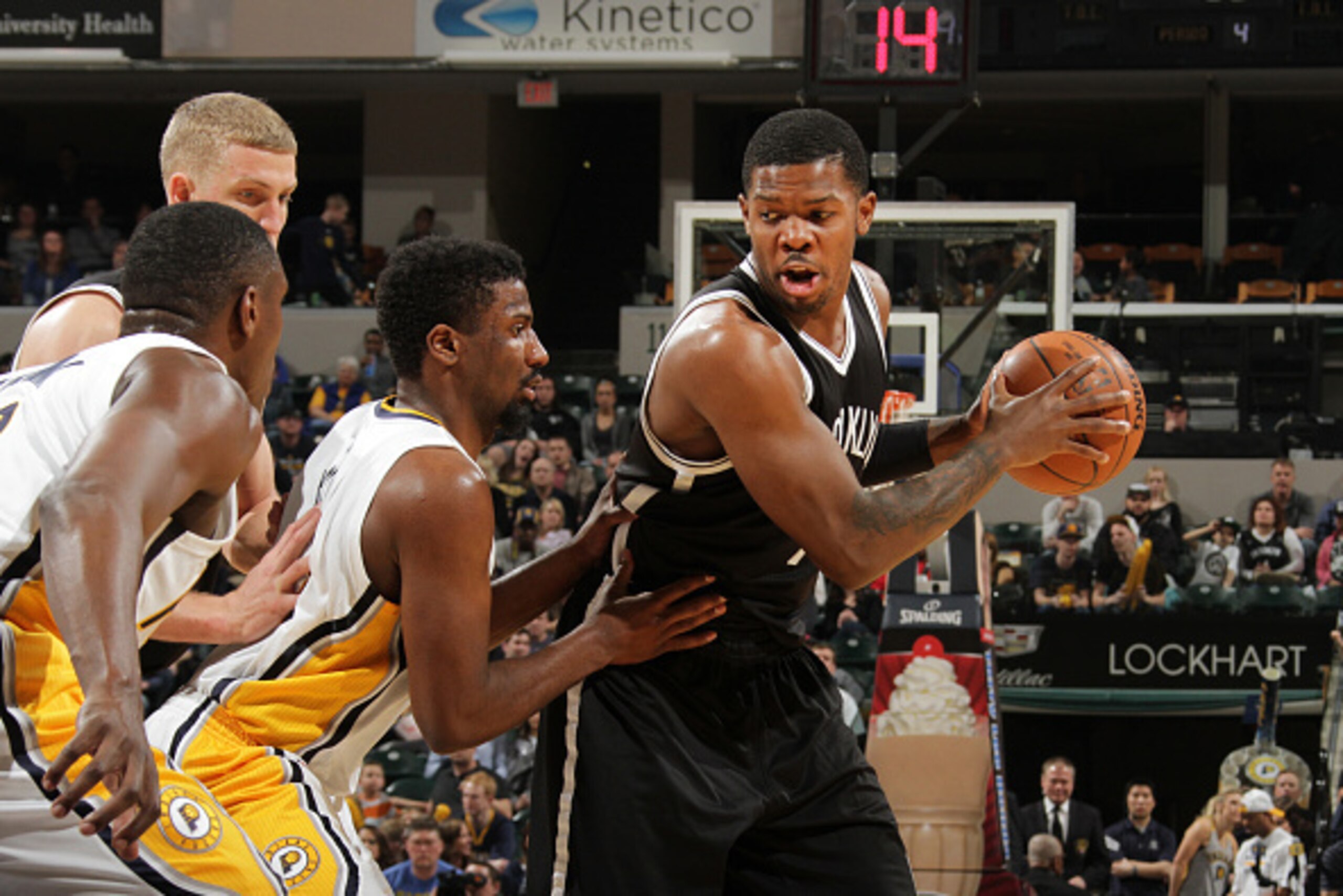 INDIANAPOLIS, IN - MARCH 21: Joe Johnson #7 of the Brooklyn Nets defends the ball against the Indiana Pacers during the game on March 21, 2015 at Bankers Life Fieldhouse in Indianapolis, Indiana. NOTE TO USER: User expressly acknowledges and agrees that, 