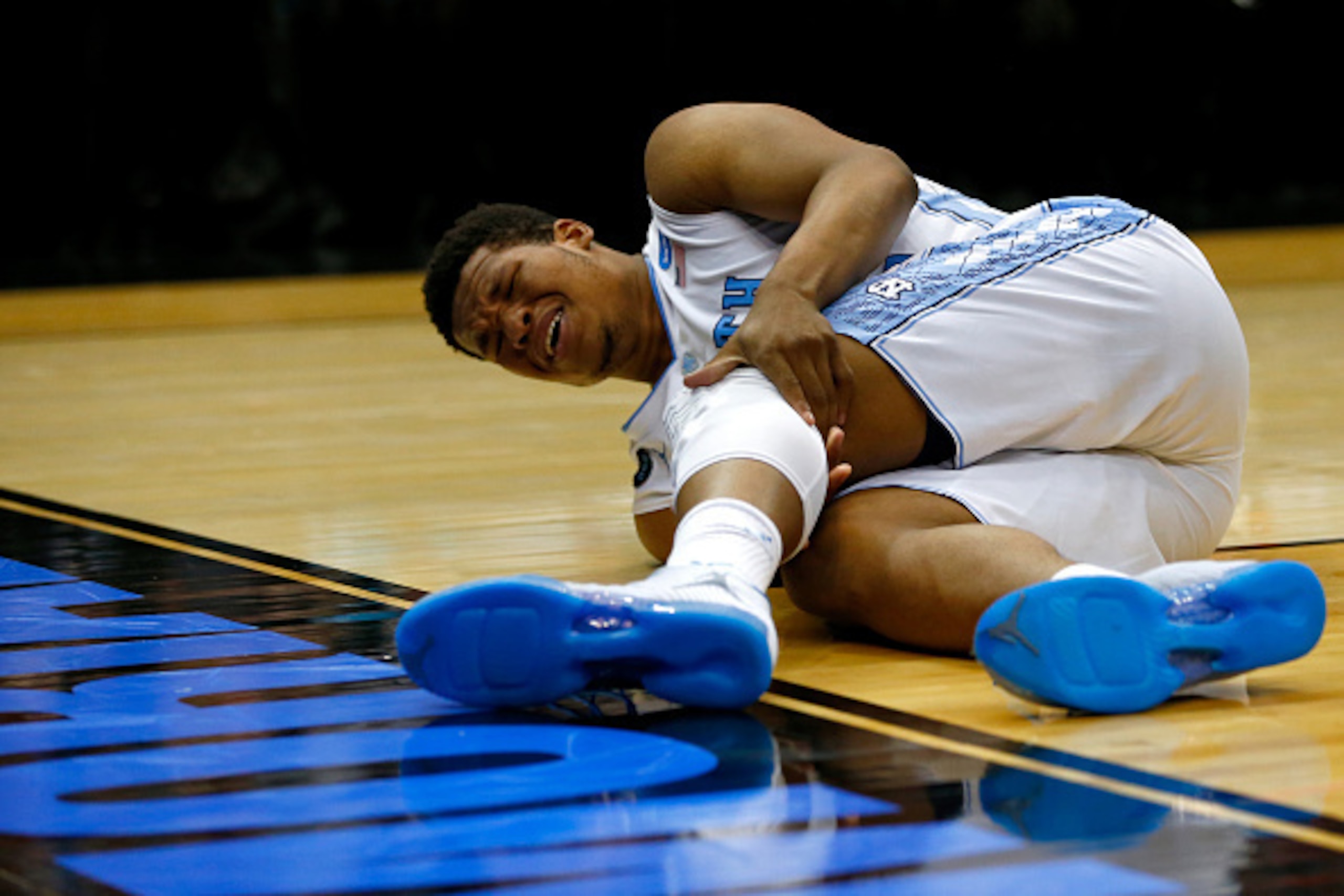 JACKSONVILLE, FL - MARCH 21: Kennedy Meeks #3 of the North Carolina Tar Heels is injured against the Arkansas Razorbacks in the second half during the third round of the 2015 NCAA Men's Basketball Tournament at Jacksonville Veterans Memorial Arena on Mar JACKSONVILLE, FL - MARCH 21: Kennedy Meeks #3 of the North Carolina Tar Heels is injured against the Arkansas Razorbacks in the second half during the third round of the 2015 NCAA Men's Basketball Tournament at Jacksonville Veterans Memorial Arena on Mar
