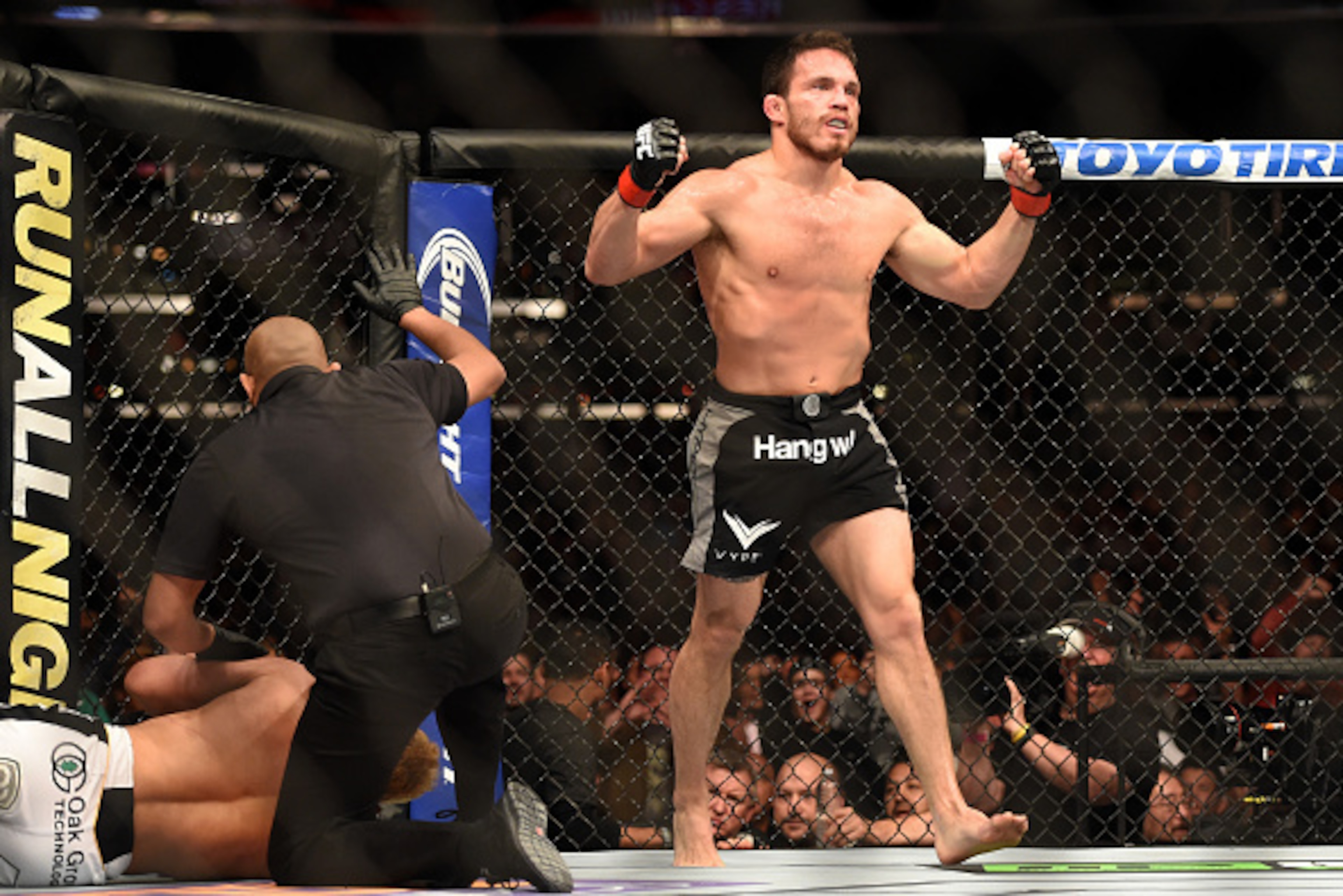 LOS ANGELES, CA - FEBRUARY 28:  Jake Ellenberger celebrates his submission victory over Josh Koscheck in their welterweight bout during the UFC 184 event at Staples Center on February 28, 2015 in Los Angeles, California.  (Photo by Harry How/Getty Images)