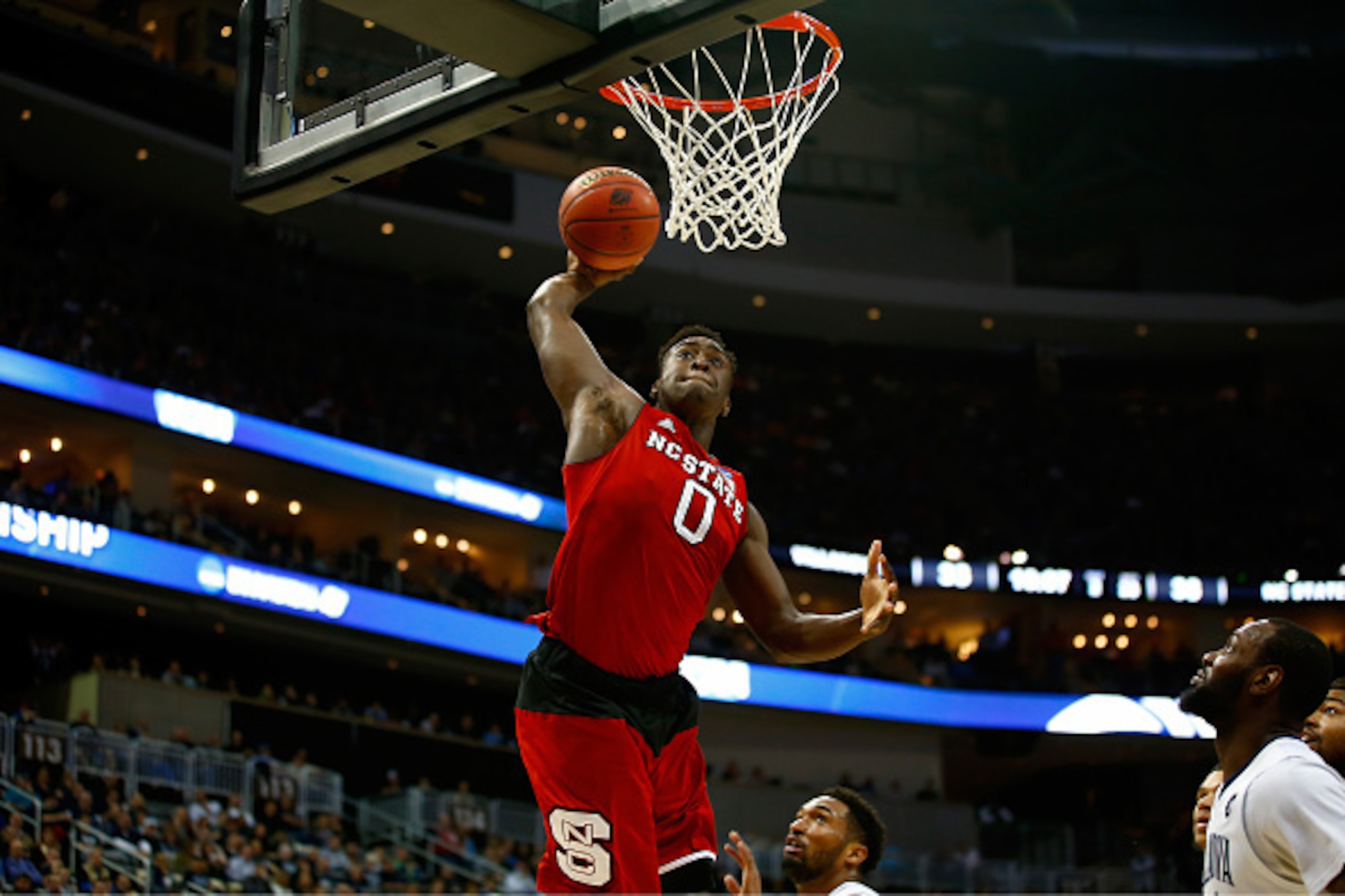 PITTSBURGH, PA - MARCH 21:  Abdul-Malik Abu #0 of the North Carolina State Wolfpack dunks against the Villanova Wildcats in the second half during the third round of the 2015 NCAA Men's Basketball Tournament at Consol Energy Center on March 21, 2015 in Pi