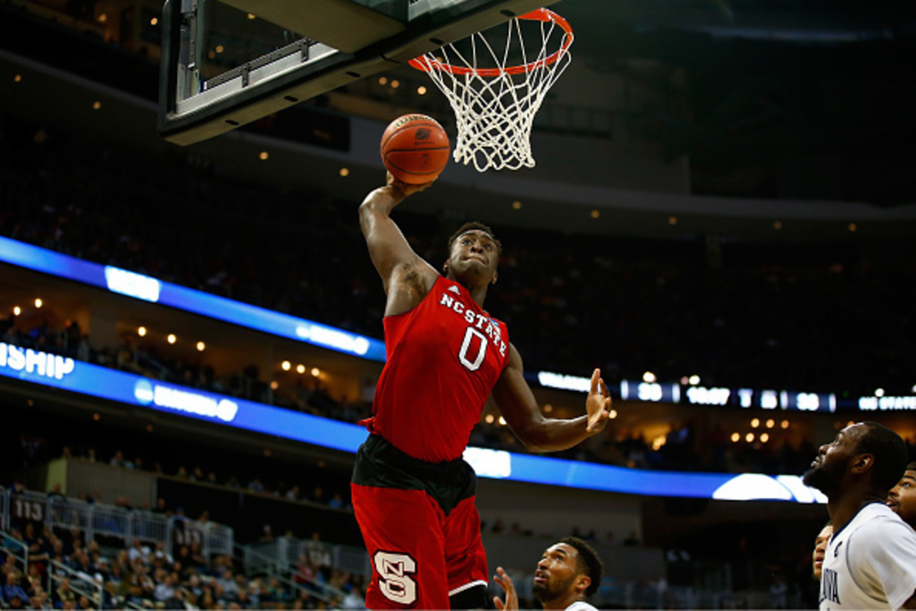 PITTSBURGH, PA - MARCH 21:  Abdul-Malik Abu #0 of the North Carolina State Wolfpack dunks against the Villanova Wildcats in the second half during the third round of the 2015 NCAA Men's Basketball Tournament at Consol Energy Center on March 21, 2015 in Pi