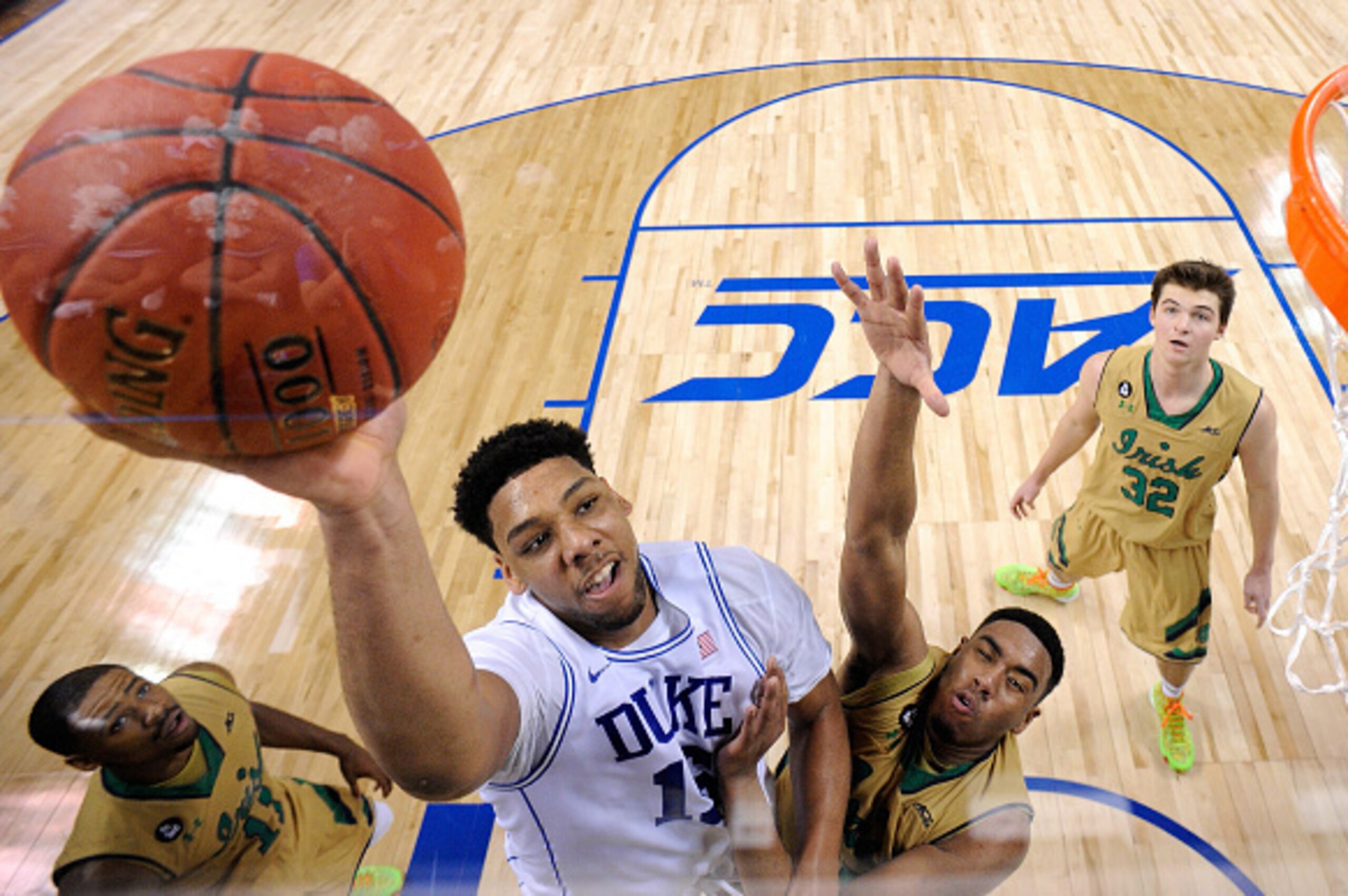 GREENSBORO, NC - MARCH 13: Jahlil Okafor #15 of the Duke Blue Devils drives to the basket against the Notre Dame Fighting Irish during the semifinals of the 2015 ACC Basketball Tournament at Greensboro Coliseum on March 13, 2015 in Greensboro, North Caro GREENSBORO, NC - MARCH 13: Jahlil Okafor #15 of the Duke Blue Devils drives to the basket against the Notre Dame Fighting Irish during the semifinals of the 2015 ACC Basketball Tournament at Greensboro Coliseum on March 13, 2015 in Greensboro, North Caro