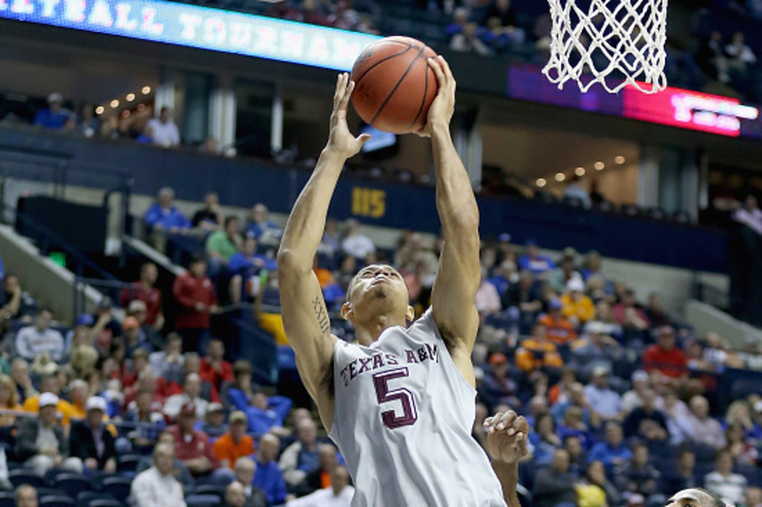NASHVILLE, TN - MARCH 12: Jordan Green #5 of the Texas A&M Aggies shoots the ball against the Auburn Tigers during the second round game of the SEC Basketball Tournament at Bridgestone Arena on March 12, 2015 in Nashville, Tennessee. (Photo by Andy Lyon NASHVILLE, TN - MARCH 12: Jordan Green #5 of the Texas A&M Aggies shoots the ball against the Auburn Tigers during the second round game of the SEC Basketball Tournament at Bridgestone Arena on March 12, 2015 in Nashville, Tennessee. (Photo by Andy Lyon