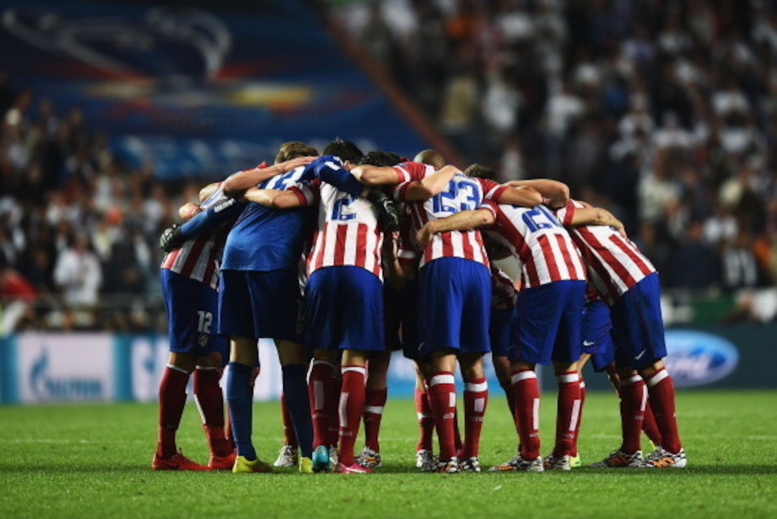 LISBON, PORTUGAL - MAY 24:  Atletico de Madrid huddlle during the UEFA Champions League Final between Real Madrid and Atletico de Madrid at Estadio da Luz on May 24, 2014 in Lisbon, Portugal.  (Photo by Laurence Griffiths/Getty Images)