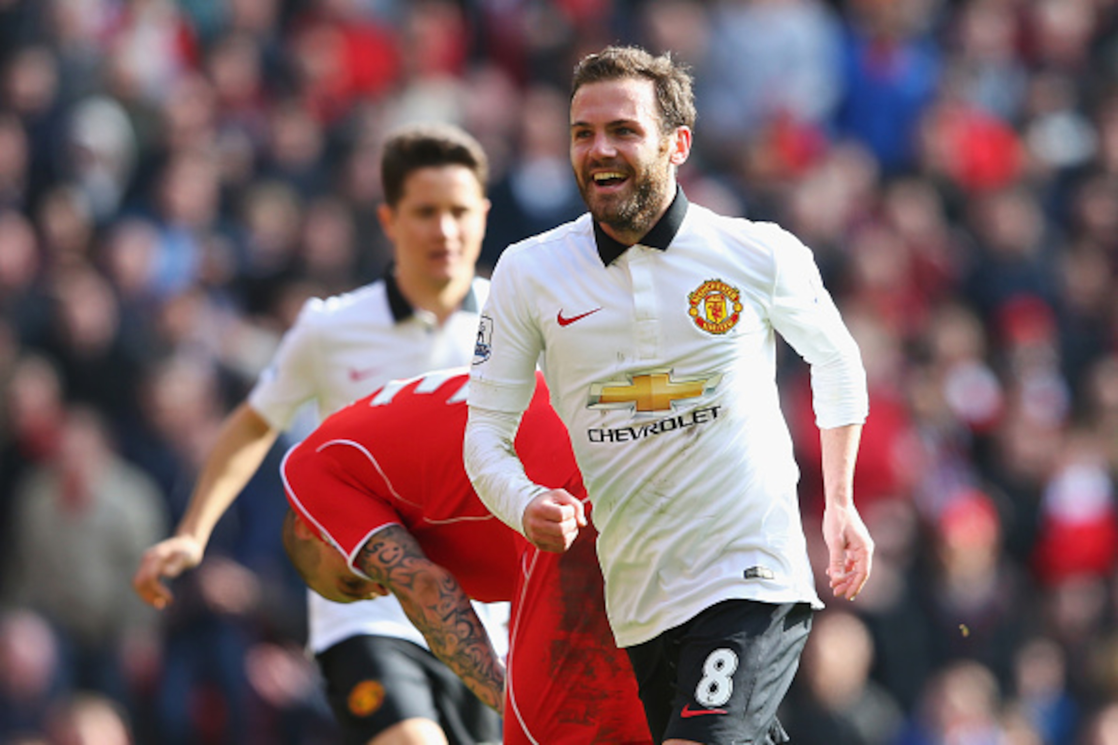 LIVERPOOL, ENGLAND - MARCH 22:  Juan Mata of Manchester United celebrates scoring his second goal during the Barclays Premier League match between Liverpool and Manchester United at Anfield on March 22, 2015 in Liverpool, England.  (Photo by Alex Livesey/