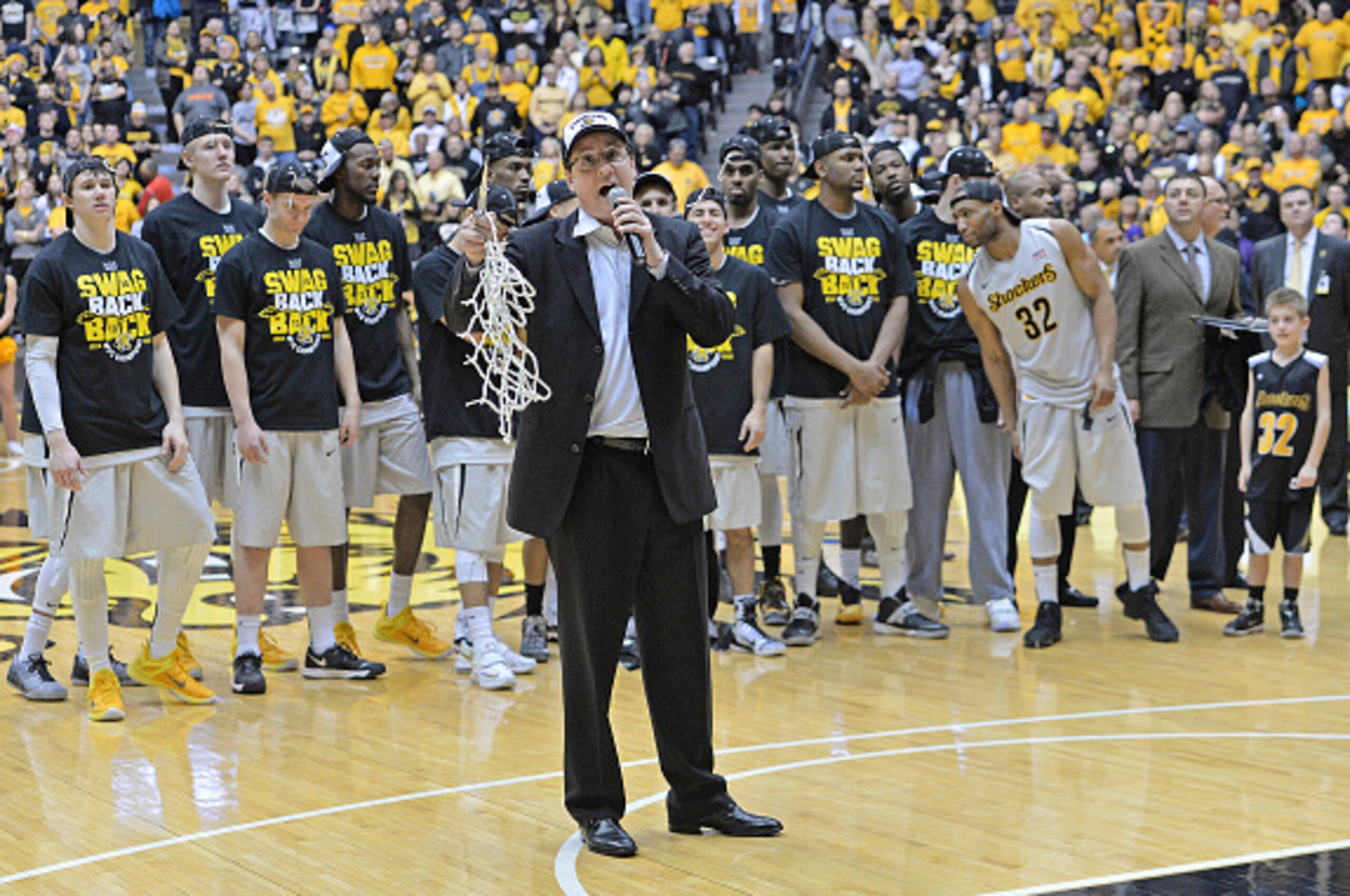 WICHITA, KS - FEBRUARY 28: Head coach Gregg Marshall (C) of the Wichita State Shockers address the crowd after beating the Northern Iowa Panthers to win the Missouri Valley Conference Championship on February 28, 2015 at Charles Koch Arena in Wichita, Kan