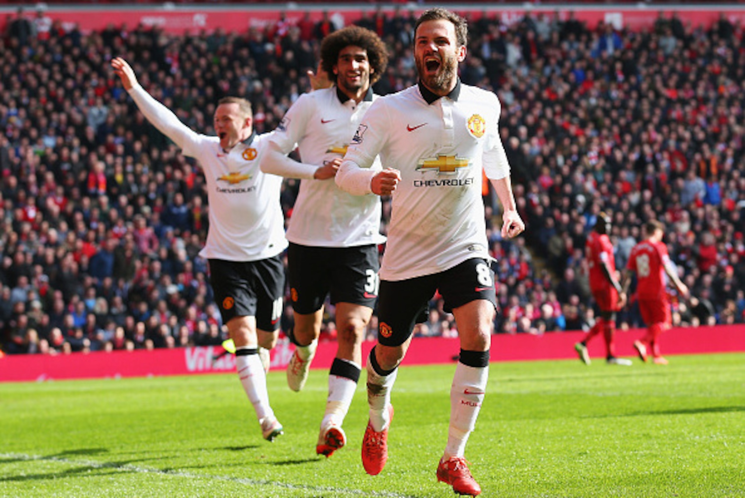 LIVERPOOL, ENGLAND - MARCH 22:  Juan Mata of Manchester United celebrates scoring his second goal during the Barclays Premier League match between Liverpool and Manchester United at Anfield on March 22, 2015 in Liverpool, England.  (Photo by Alex Livesey/