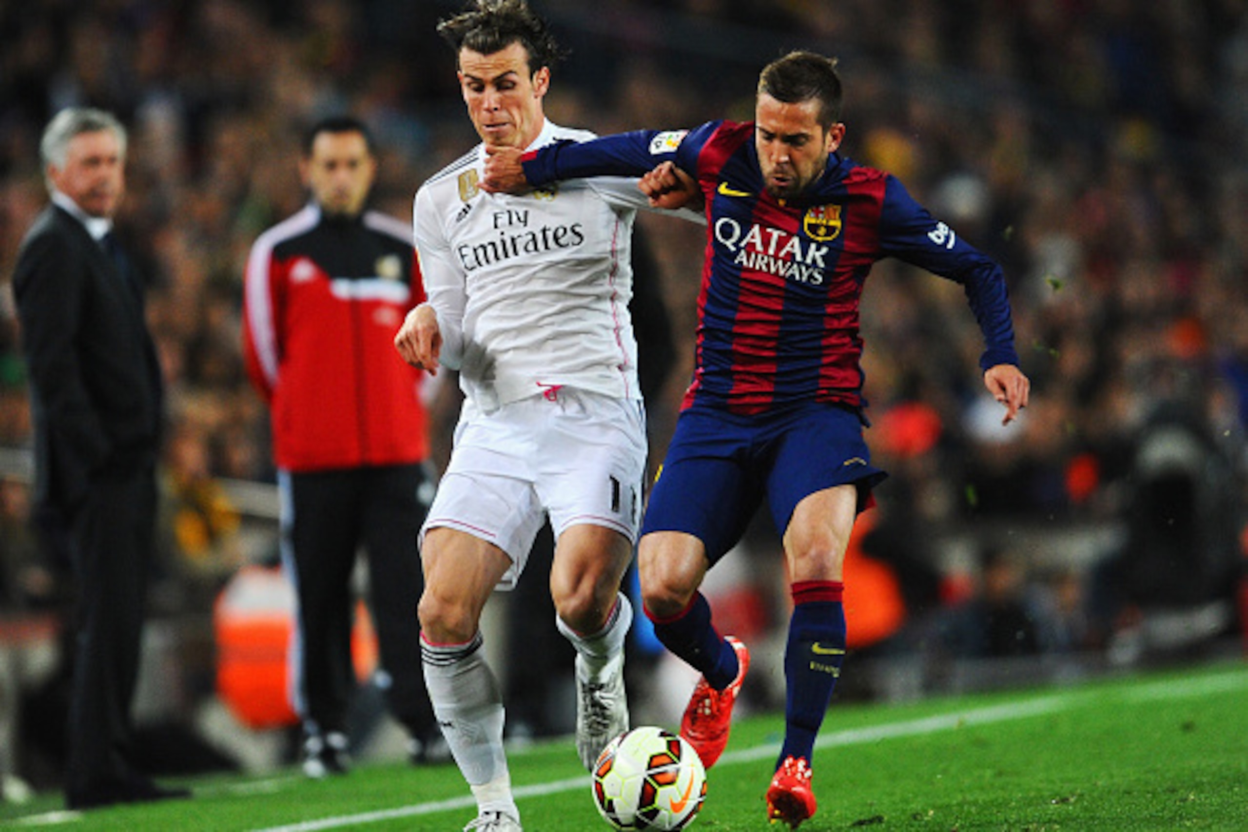 BARCELONA, SPAIN - MARCH 22:  Gareth Bale of Real Madrid CF battles with Jordi Alba of Barcelona during the La Liga match between FC Barcelona and Real Madrid CF at Camp Nou on March 22, 2015 in Barcelona, Spain.  (Photo by David Ramos/Getty Images)