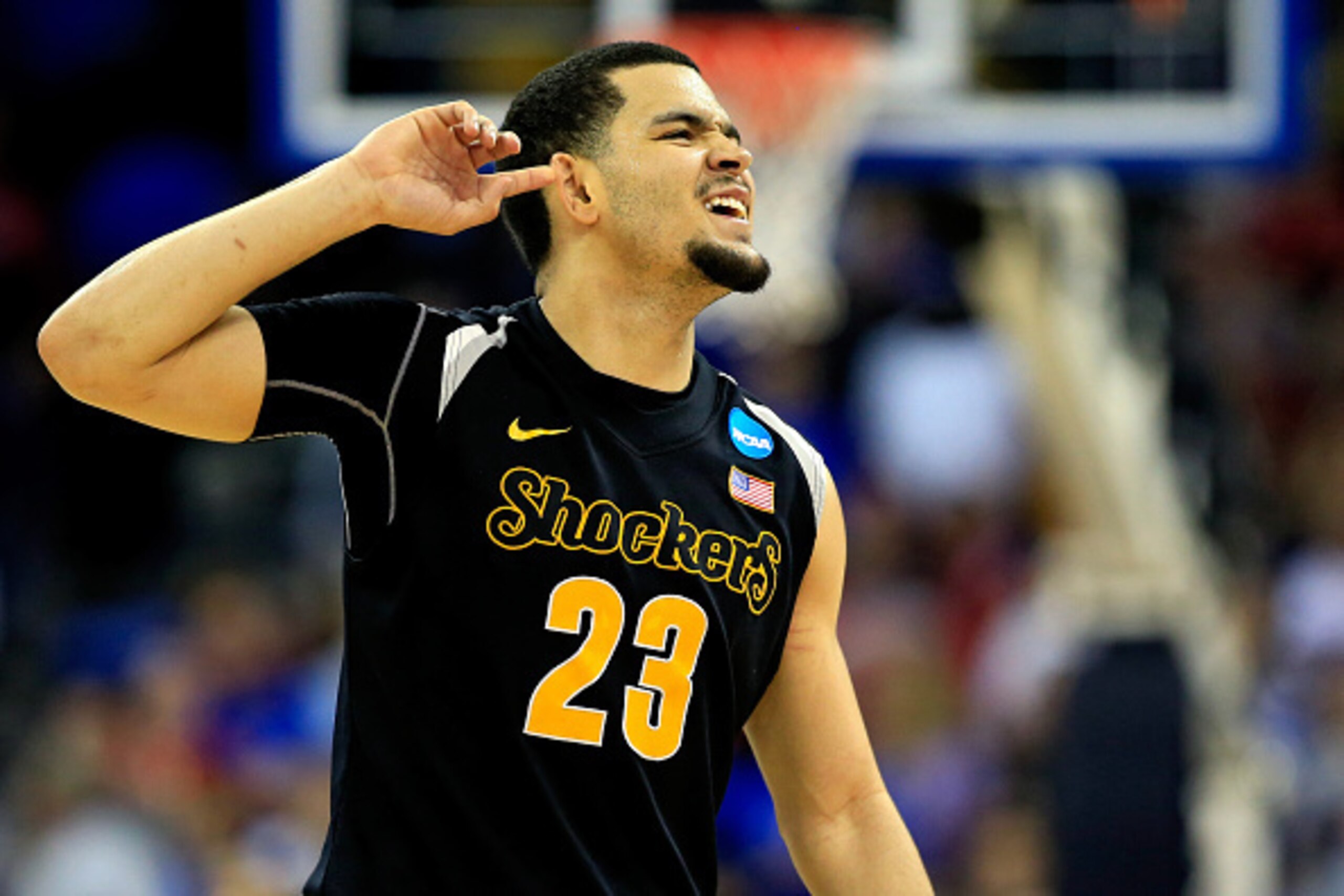 OMAHA, NE - MARCH 22:  Fred VanVleet #23 of the Wichita State Shockers celebrates as the second half ends against the Kansas Jayhawks during the third round of the 2015 NCAA Men's Basketball Tournament at the CenturyLink Center on March 22, 2015 in Omaha,