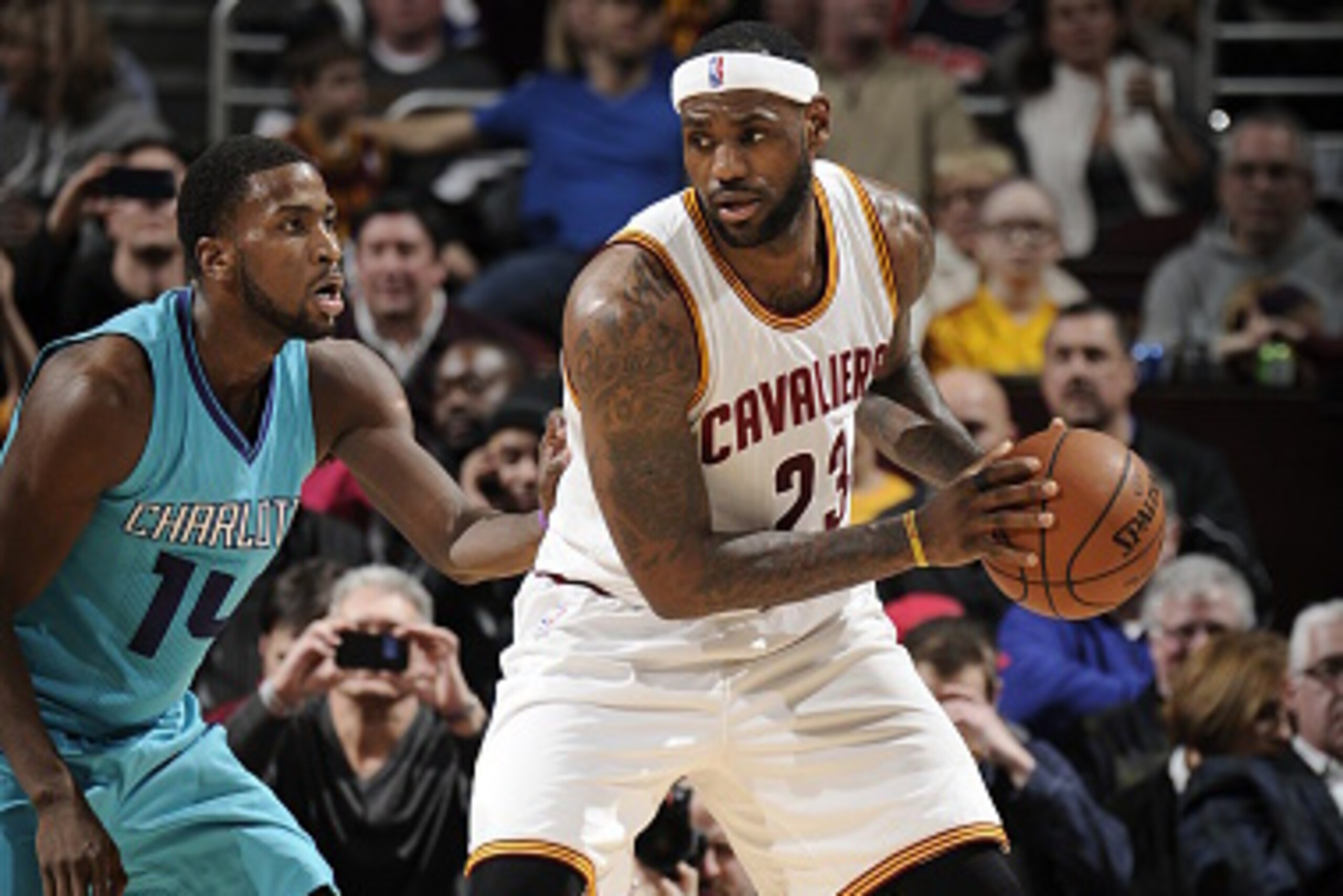 CLEVELAND, OH - JANUARY 23: LeBron James #23 of the Cleveland Cavaliers handles the ball against the Charlotte Hornets at The Quicken Loans Arena on January 23, 2015 in Cleveland, Ohio. NOTE TO USER: User expressly acknowledges and agrees that, by downloa