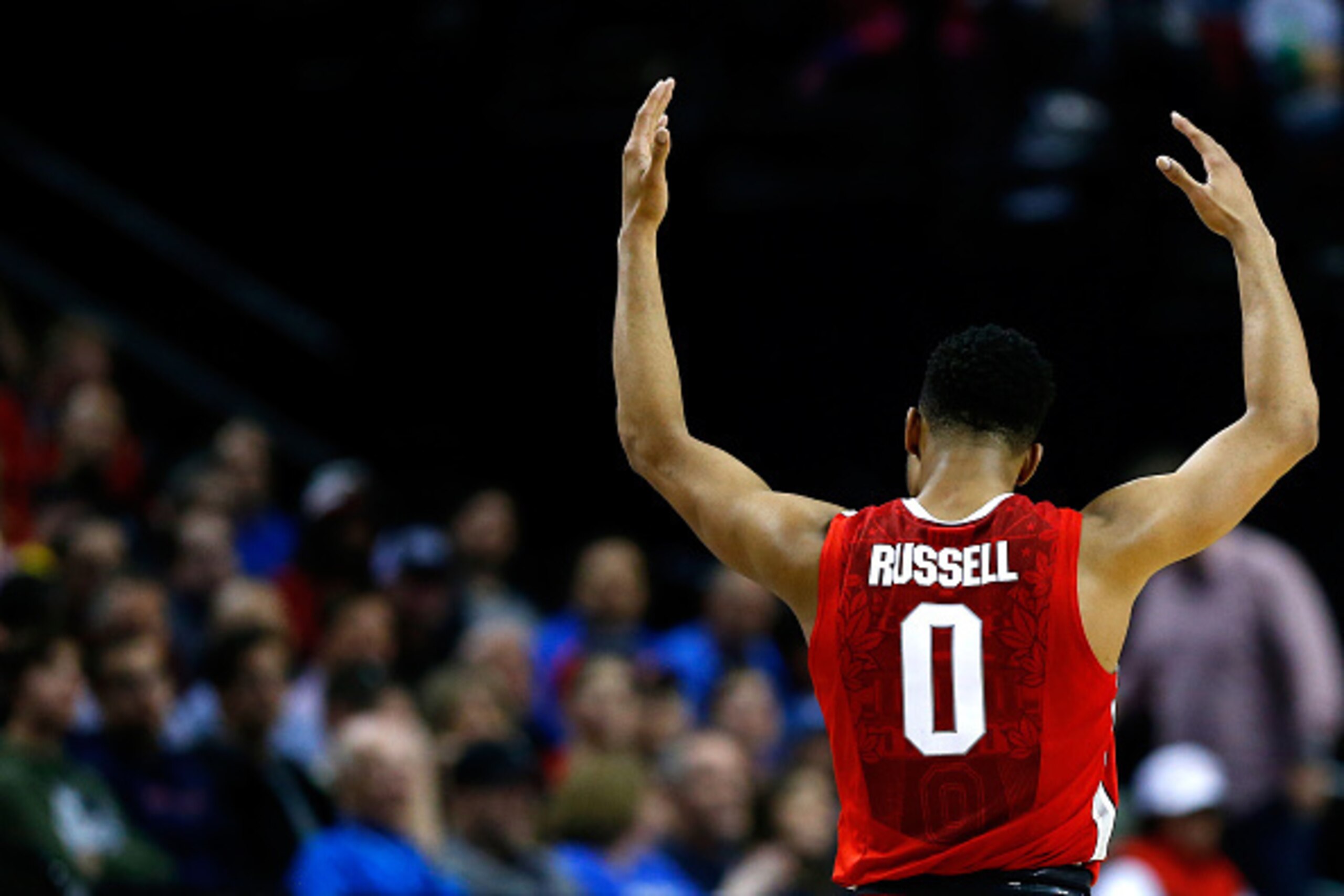 PORTLAND, OR - MARCH 19: D'Angelo Russell #0 of the Ohio State Buckeyes acknowledges the crowd against the Virginia Commonwealth Rams in the second half during the second round of the 2015 NCAA Men's Basketball Tournament at Moda Center on March 19, 2015 