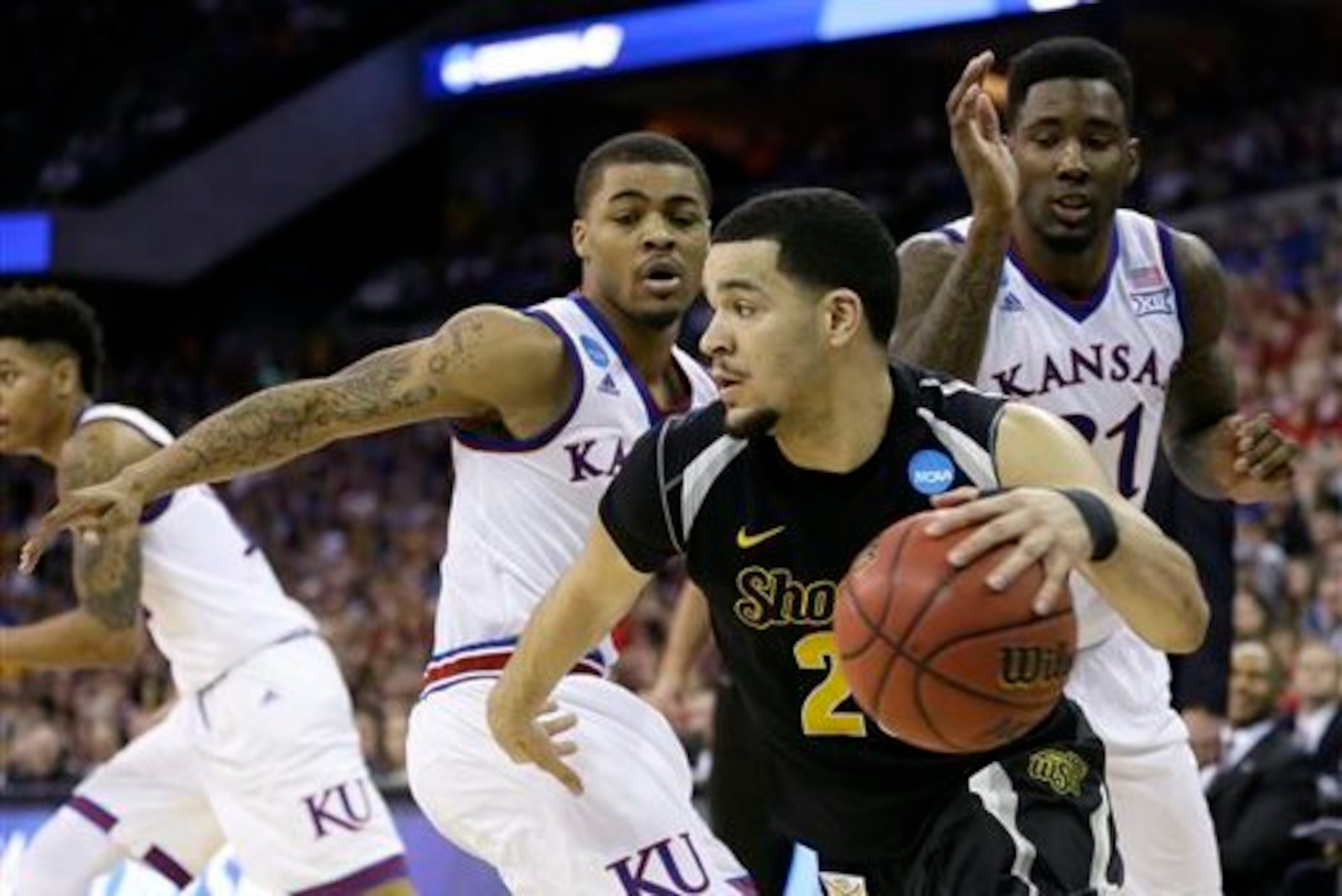 Fred VanVleet scored 17 points and added six assists to guide the Shockers past Kansas and into the Sweet 16.