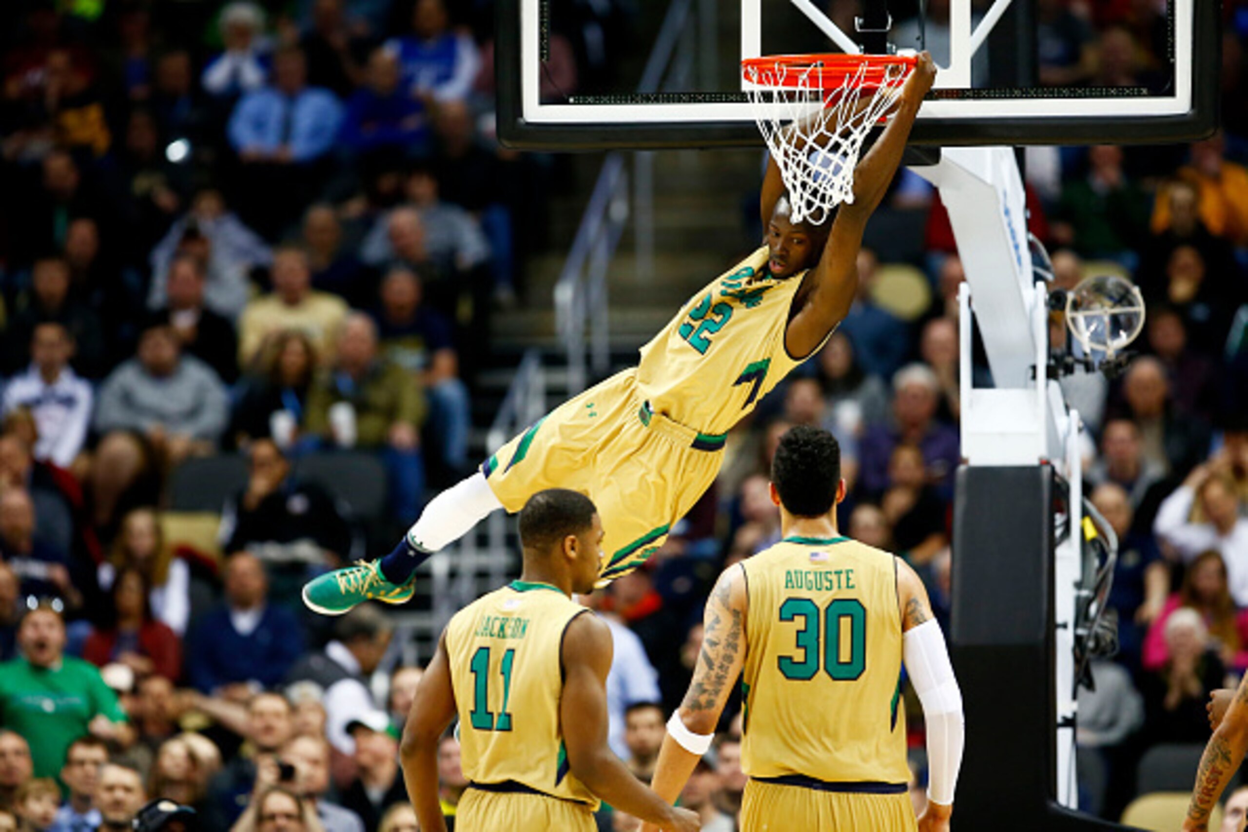 PITTSBURGH, PA - MARCH 19:  Jerian Grant #22 of the Notre Dame Fighting Irish dunks against the Northeastern Huskies in the second half during the second round of the 2015 NCAA Men's Basketball Tournament at Consol Energy Center on March 19, 2015 in Pitts