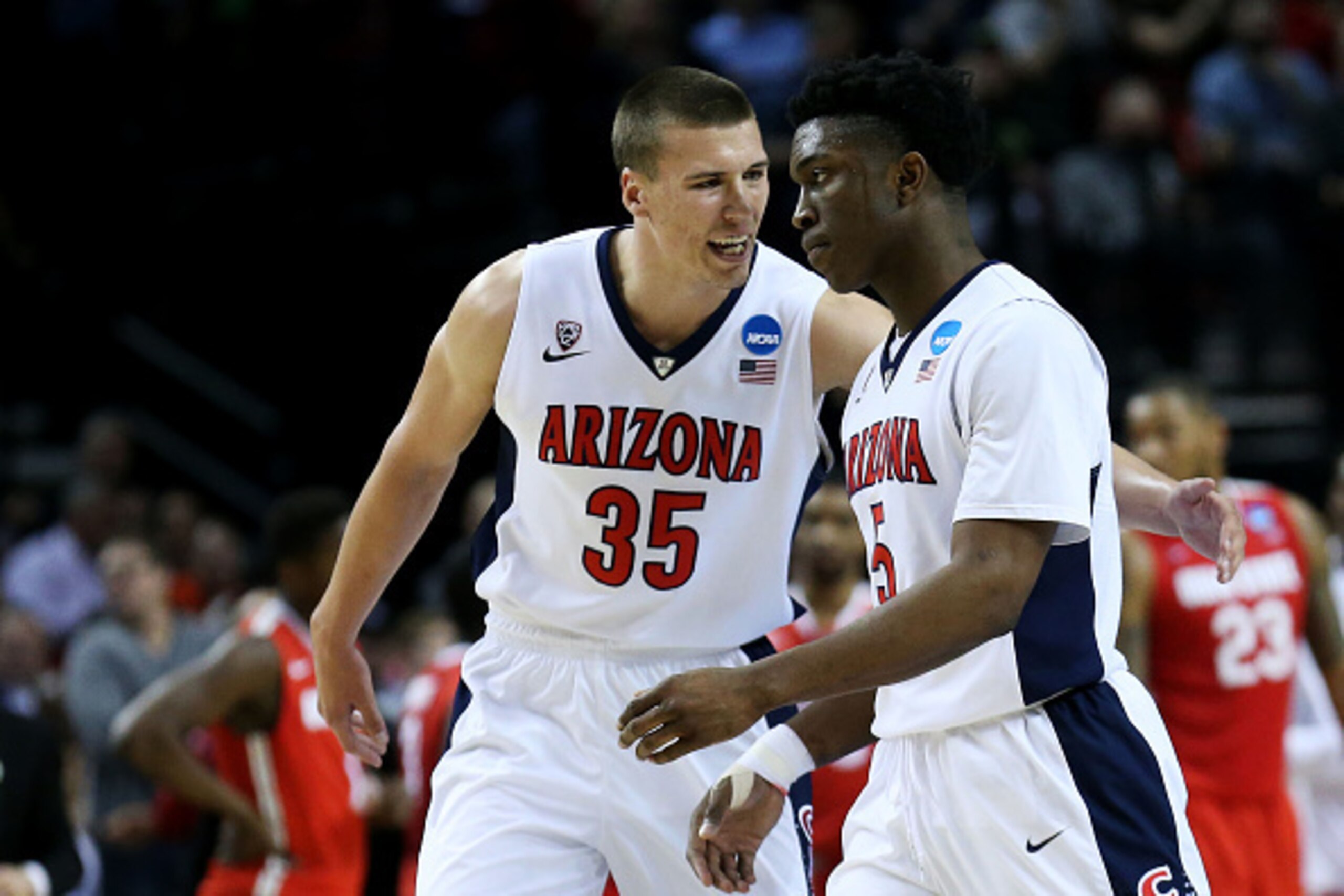 PORTLAND, OR - MARCH 21:  Kaleb Tarczewski #35 and Stanley Johnson #5 of the Arizona Wildcats react in the second half against the Ohio State Buckeyes during the third round of the 2015 NCAA Men's Basketball Tournament at Moda Center on March 21, 2015 in 