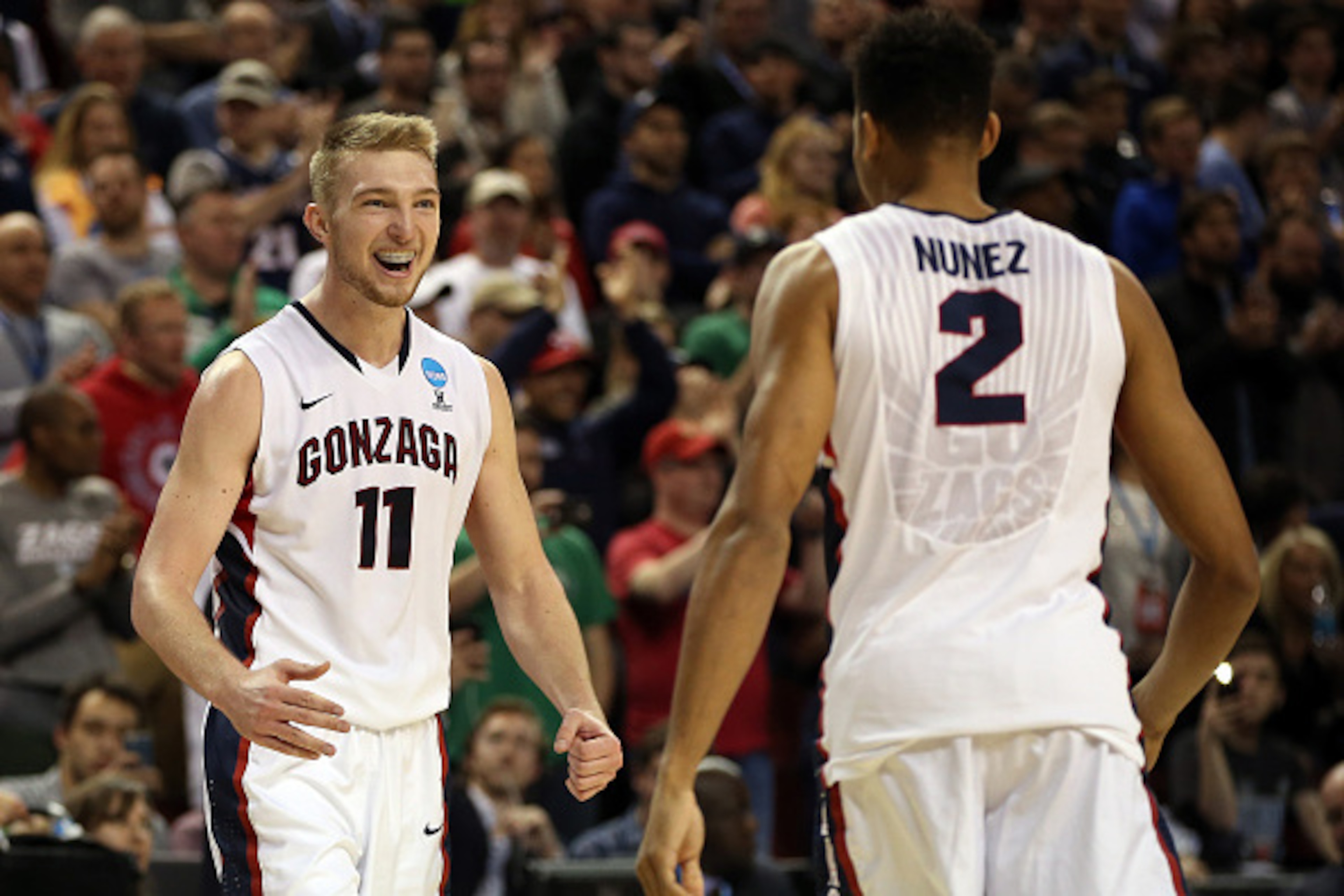 SEATTLE, WA - MARCH 22:  Domantas Sabonis #11 of the Gonzaga Bulldogs celebrates with Angel Nunez #2 against the Iowa Hawkeyes in the second half of the game during the third round of the 2015 NCAA Men's Basketball Tournament at KeyArena on March 22, 2015