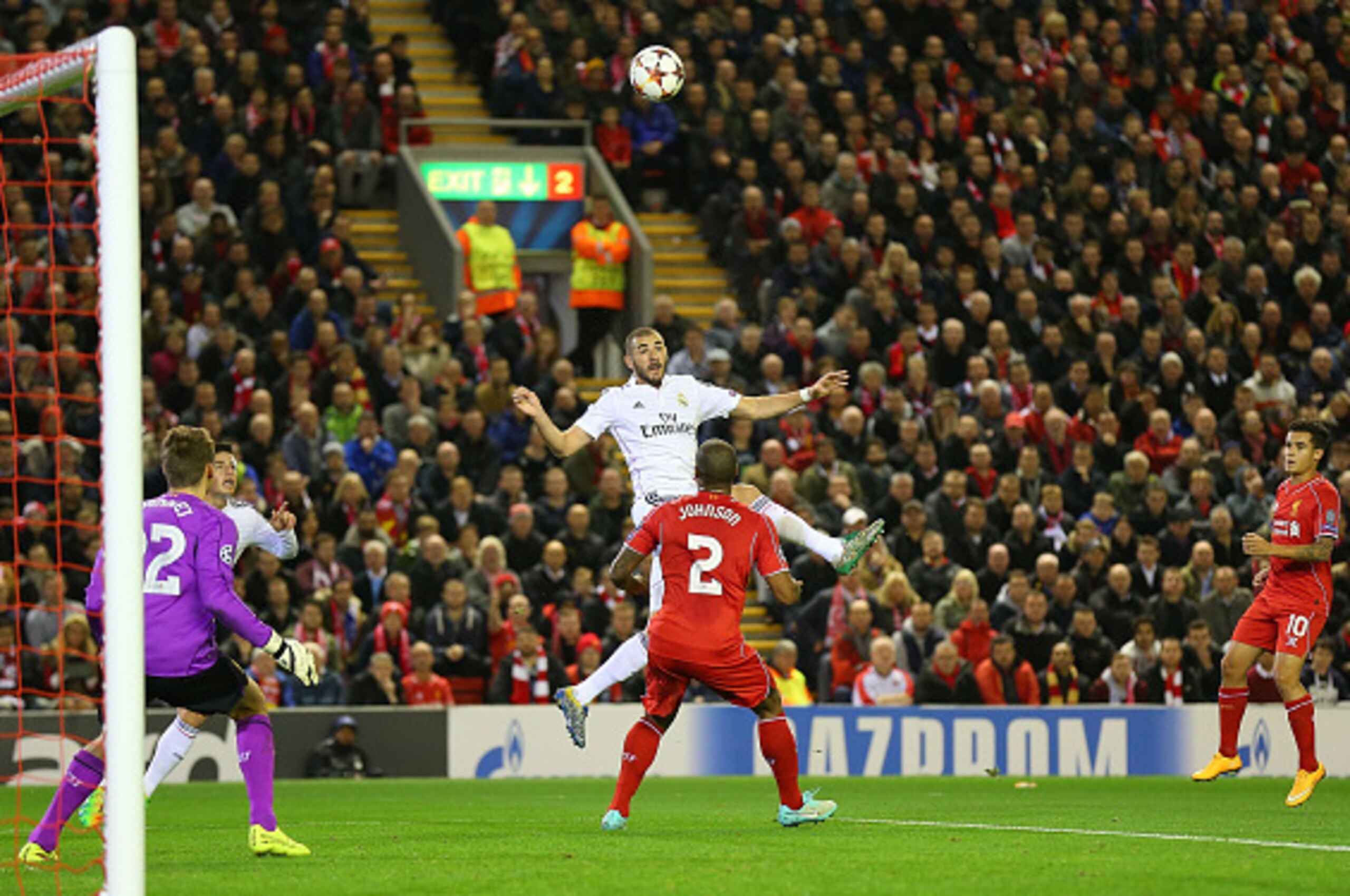 LIVERPOOL, ENGLAND - OCTOBER 22:  Karim Benzema of Real Madrid scores his team's second goal during the UEFA Champions League Group B match between Liverpool and Real Madrid CF on October 22, 2014 in Liverpool, United Kingdom.  (Photo by Alex Livesey/Gett