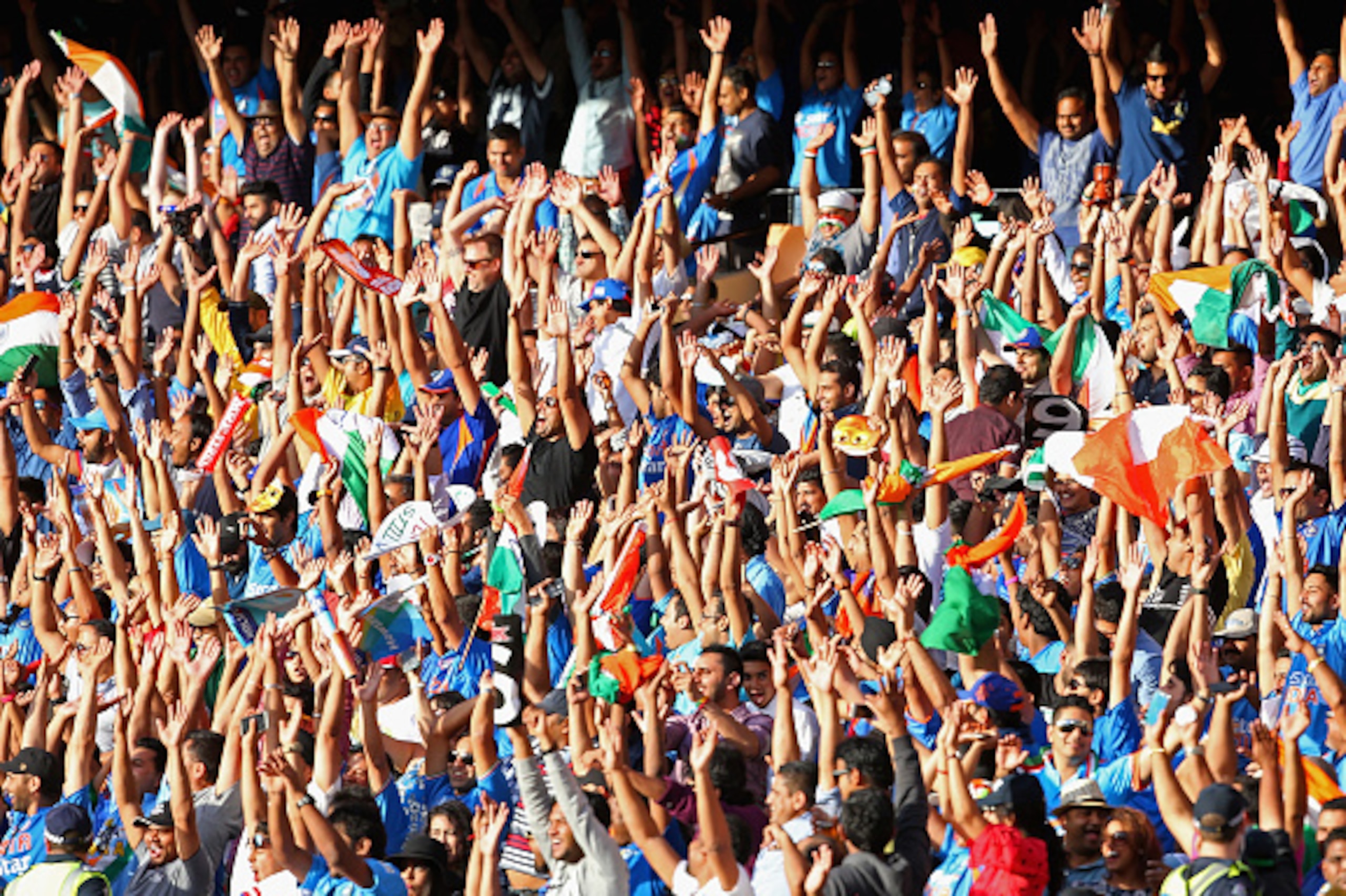 MELBOURNE, AUSTRALIA - MARCH 19:  Fans show their support during the 2015 ICC Cricket World Cup Quater Final match between India and Bangldesh at Melbourne Cricket Ground on March 19, 2015 in Melbourne, Australia.  (Photo by Quinn Rooney/Getty Images)