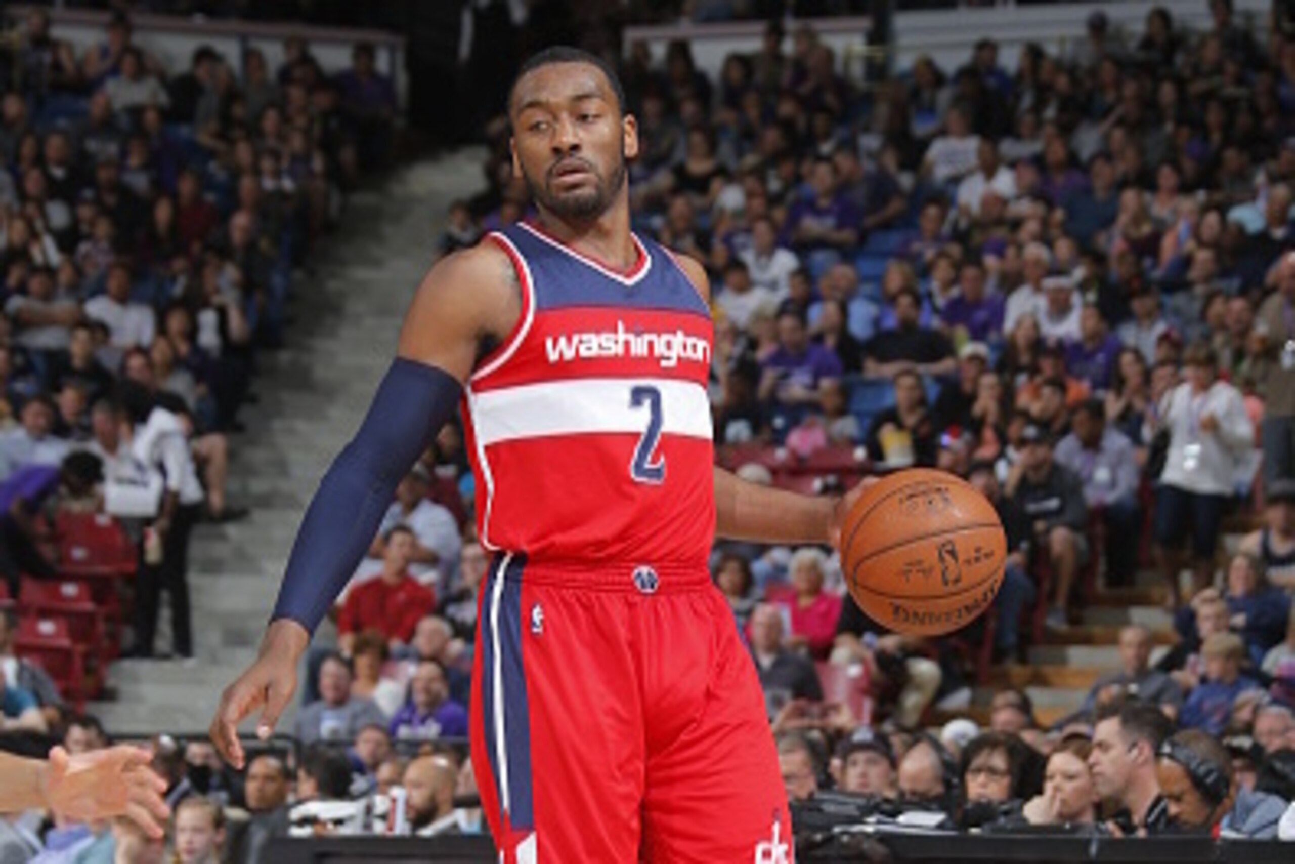 SACRAMENTO, CA - MARCH 22: John Wall #2 of the Washington Wizards handles the ball against the Sacramento Kings on March 22, 2015 at Sleep Train Arena in Sacramento, California. NOTE TO USER: User expressly acknowledges and agrees that, by downloading an SACRAMENTO, CA - MARCH 22: John Wall #2 of the Washington Wizards handles the ball against the Sacramento Kings on March 22, 2015 at Sleep Train Arena in Sacramento, California. NOTE TO USER: User expressly acknowledges and agrees that, by downloading an