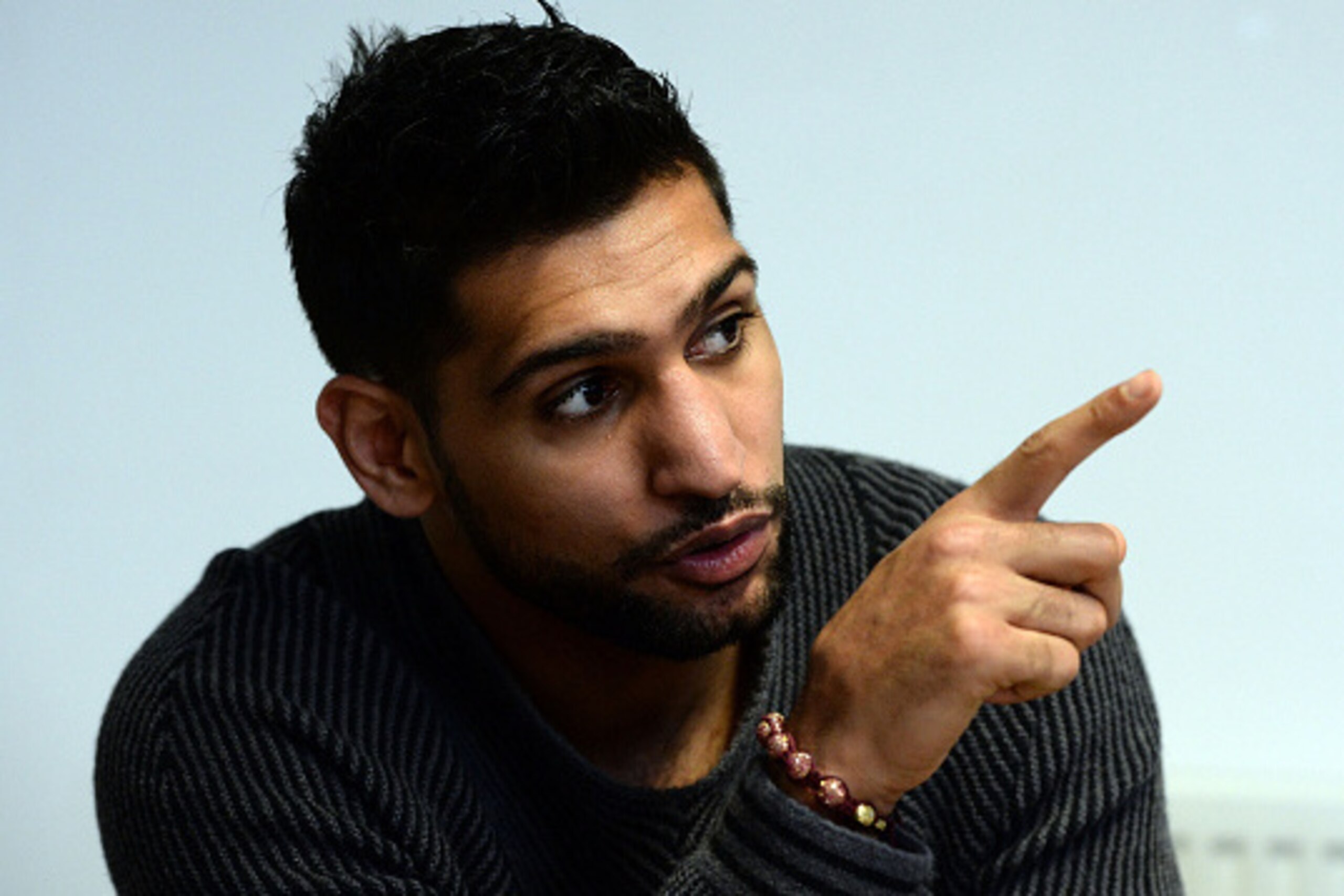 SHEFFIELD, ENGLAND - FEBRUARY 19: Boxer Amir Khan speaks to media during a visit to Fight Label who make his shorts on February 19, 2015 in Sheffield, England. (Photo by Nigel Roddis/Getty Images) SHEFFIELD, ENGLAND - FEBRUARY 19: Boxer Amir Khan speaks to media during a visit to Fight Label who make his shorts on February 19, 2015 in Sheffield, England. (Photo by Nigel Roddis/Getty Images)