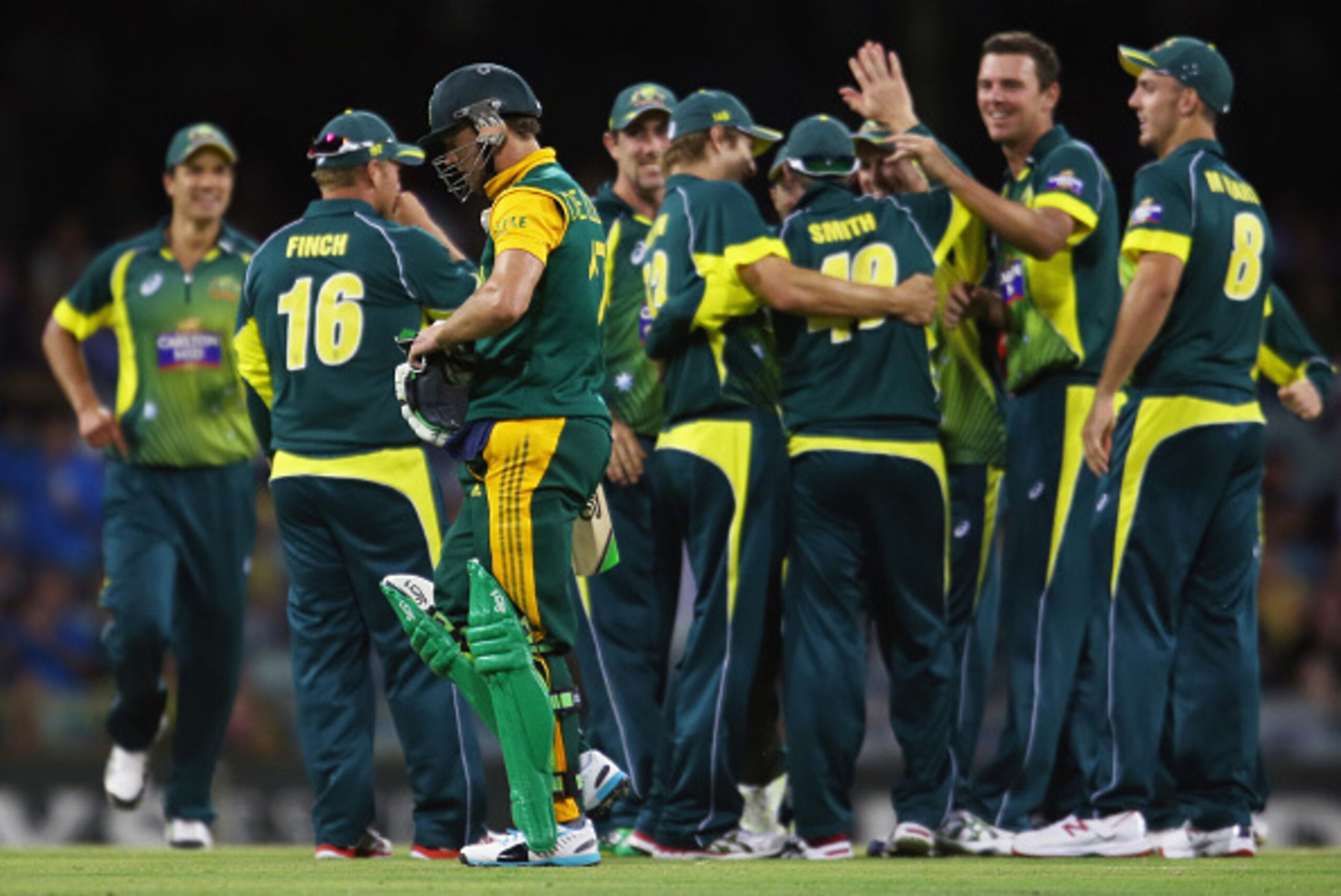 PERTH, AUSTRALIA - NOVEMBER 14:  Australia celebrate after AB de Villiers of South Africa is run out during game one of the men's one day international series between Australia and South Africa at WACA on November 14, 2014 in Perth, Australia.  (Photo by 