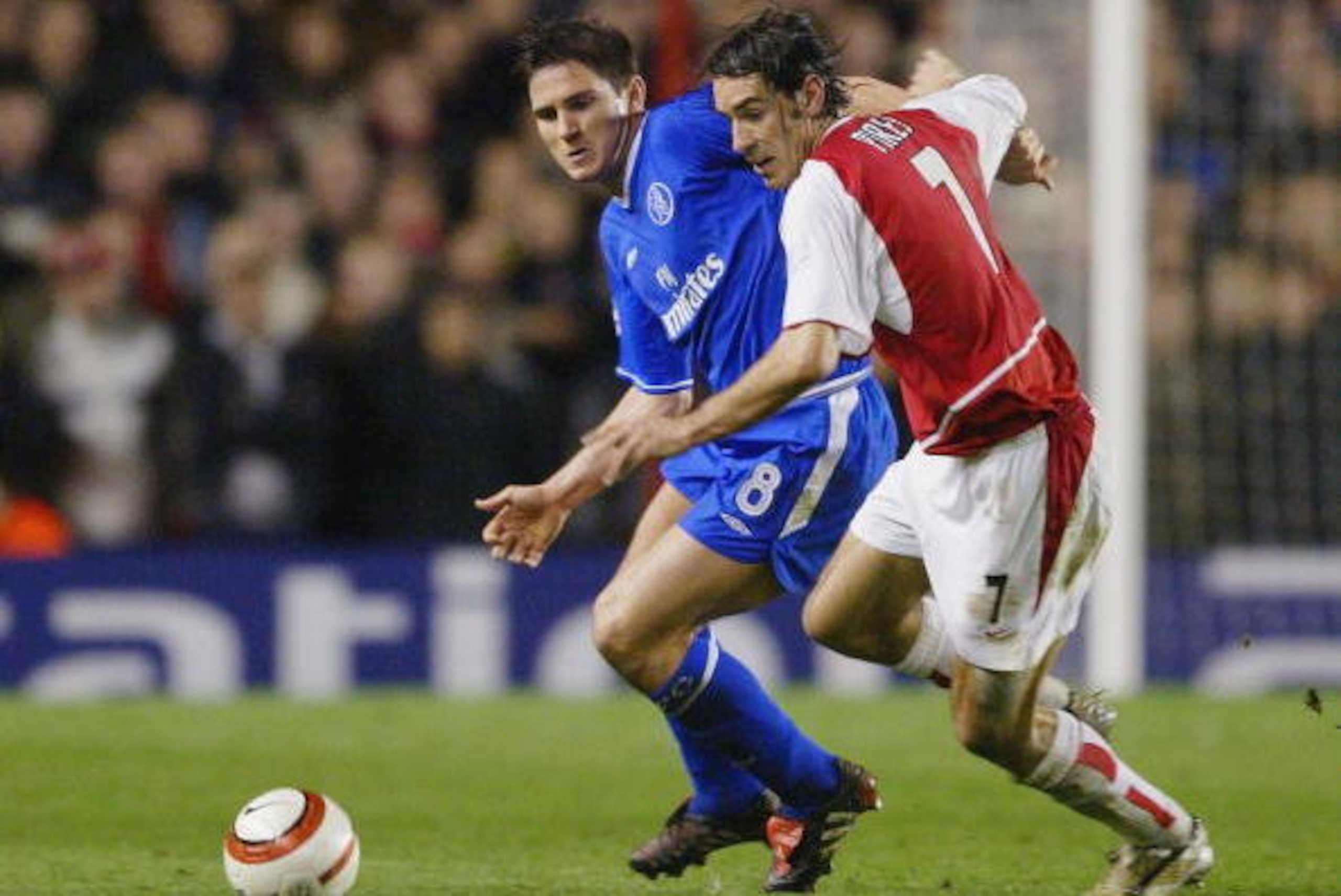 LONDON - APRIL 6: Robert Pires of Arsenal battles with Frank Lampard of Chelsea during the UEFA Champions League Quarter Final Second Leg match between Arsenal and Chelsea at Highbury on March 6, 2004 in London. (Photo by Clive Mason/Getty Images) LONDON - APRIL 6: Robert Pires of Arsenal battles with Frank Lampard of Chelsea during the UEFA Champions League Quarter Final Second Leg match between Arsenal and Chelsea at Highbury on March 6, 2004 in London. (Photo by Clive Mason/Getty Images)