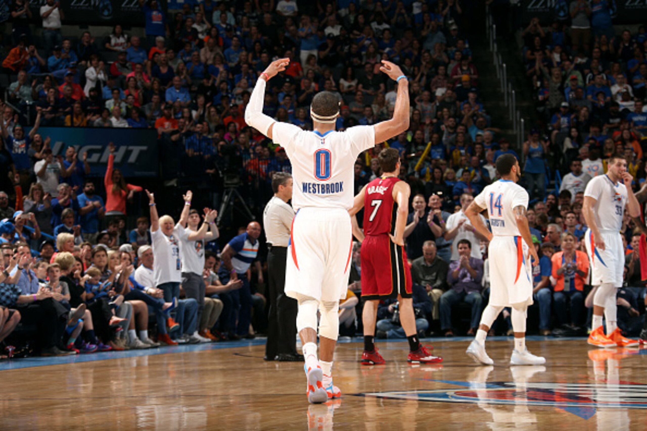 OKLAHOMA CITY, OK- March 22: Russell Westbrook #0 of the Oklahoma City Thunder celebrates during a game against the Miami Heat on March 22, 2015 at Chesapeake Energy Arena in Oklahoma City, Oklahoma. NOTE TO USER: User expressly acknowledges and agrees th