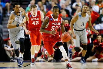 PORTLAND, OR - MARCH 21:  Delon Wright #55 of the Utah Utes drives against the Georgetown Hoyas in the first half during the third round of the 2015 NCAA Men's Basketball Tournament at Moda Center on March 21, 2015 in Portland, Oregon.  (Photo by Jonathan