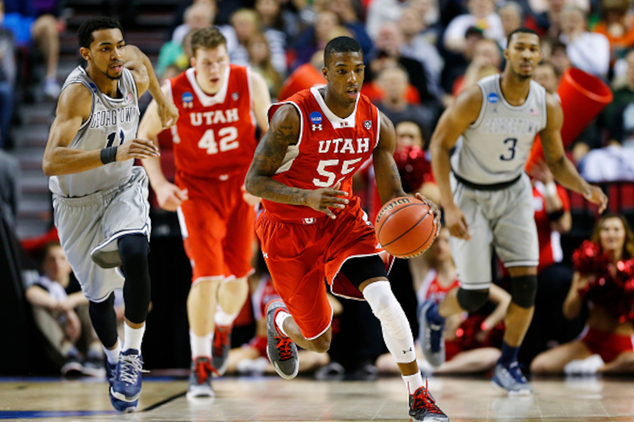 PORTLAND, OR - MARCH 21: Delon Wright #55 of the Utah Utes drives against the Georgetown Hoyas in the first half during the third round of the 2015 NCAA Men's Basketball Tournament at Moda Center on March 21, 2015 in Portland, Oregon. (Photo by Jonathan PORTLAND, OR - MARCH 21: Delon Wright #55 of the Utah Utes drives against the Georgetown Hoyas in the first half during the third round of the 2015 NCAA Men's Basketball Tournament at Moda Center on March 21, 2015 in Portland, Oregon. (Photo by Jonathan