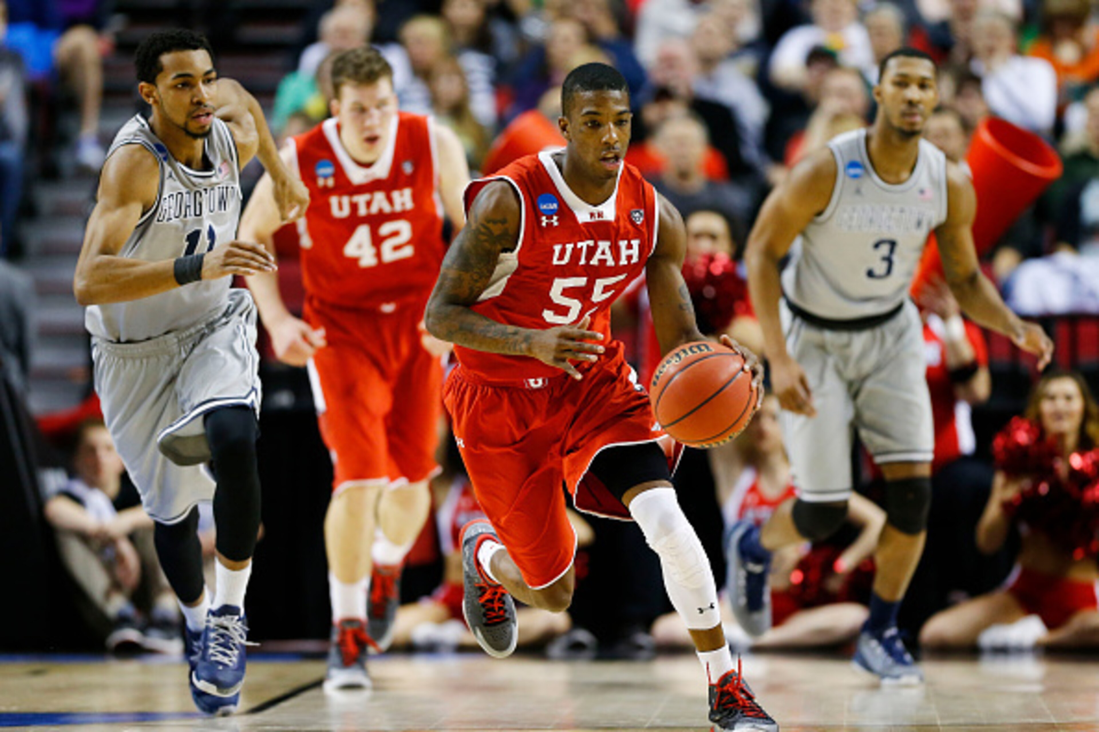 PORTLAND, OR - MARCH 21:  Delon Wright #55 of the Utah Utes drives against the Georgetown Hoyas in the first half during the third round of the 2015 NCAA Men's Basketball Tournament at Moda Center on March 21, 2015 in Portland, Oregon.  (Photo by Jonathan