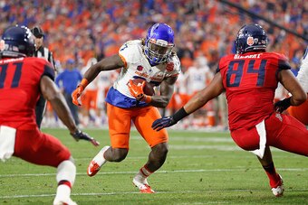GLENDALE, AZ - DECEMBER 31:  Running back Jay Ajayi #27 of the Boise State Broncos rushes the football against the Arizona Wildcats during the Vizio Fiesta Bowl at University of Phoenix Stadium on December 31, 2014 in Glendale, Arizona.  (Photo by Christi