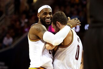 CLEVELAND, OH - DECEMBER 23:  LeBron James #23 and Kevin Love #0 of the Cleveland Cavaliers react after a play in the second half against the Minnesota Timberwolves at Quicken Loans Arena on December 23, 2014 in Cleveland, Ohio. NOTE TO USER: User express