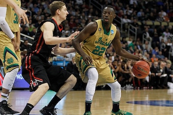 PITTSBURGH, PA - MARCH 19:  Jerian Grant #22 of the Notre Dame Fighting Irish plays against the Northeastern Huskies during the second round of the 2015 NCAA Men's Basketball Tournament at Consol Energy Center on March 19, 2015 in Pittsburgh, Pennsylvania