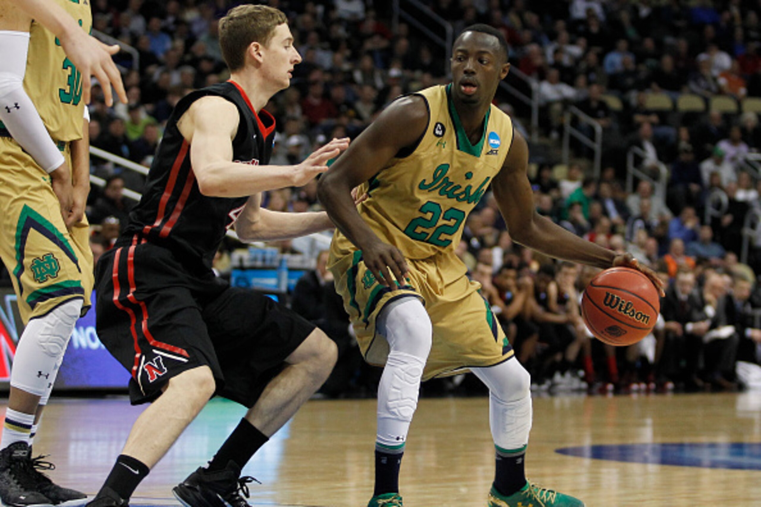 PITTSBURGH, PA - MARCH 19: Jerian Grant #22 of the Notre Dame Fighting Irish plays against the Northeastern Huskies during the second round of the 2015 NCAA Men's Basketball Tournament at Consol Energy Center on March 19, 2015 in Pittsburgh, Pennsylvania PITTSBURGH, PA - MARCH 19: Jerian Grant #22 of the Notre Dame Fighting Irish plays against the Northeastern Huskies during the second round of the 2015 NCAA Men's Basketball Tournament at Consol Energy Center on March 19, 2015 in Pittsburgh, Pennsylvania