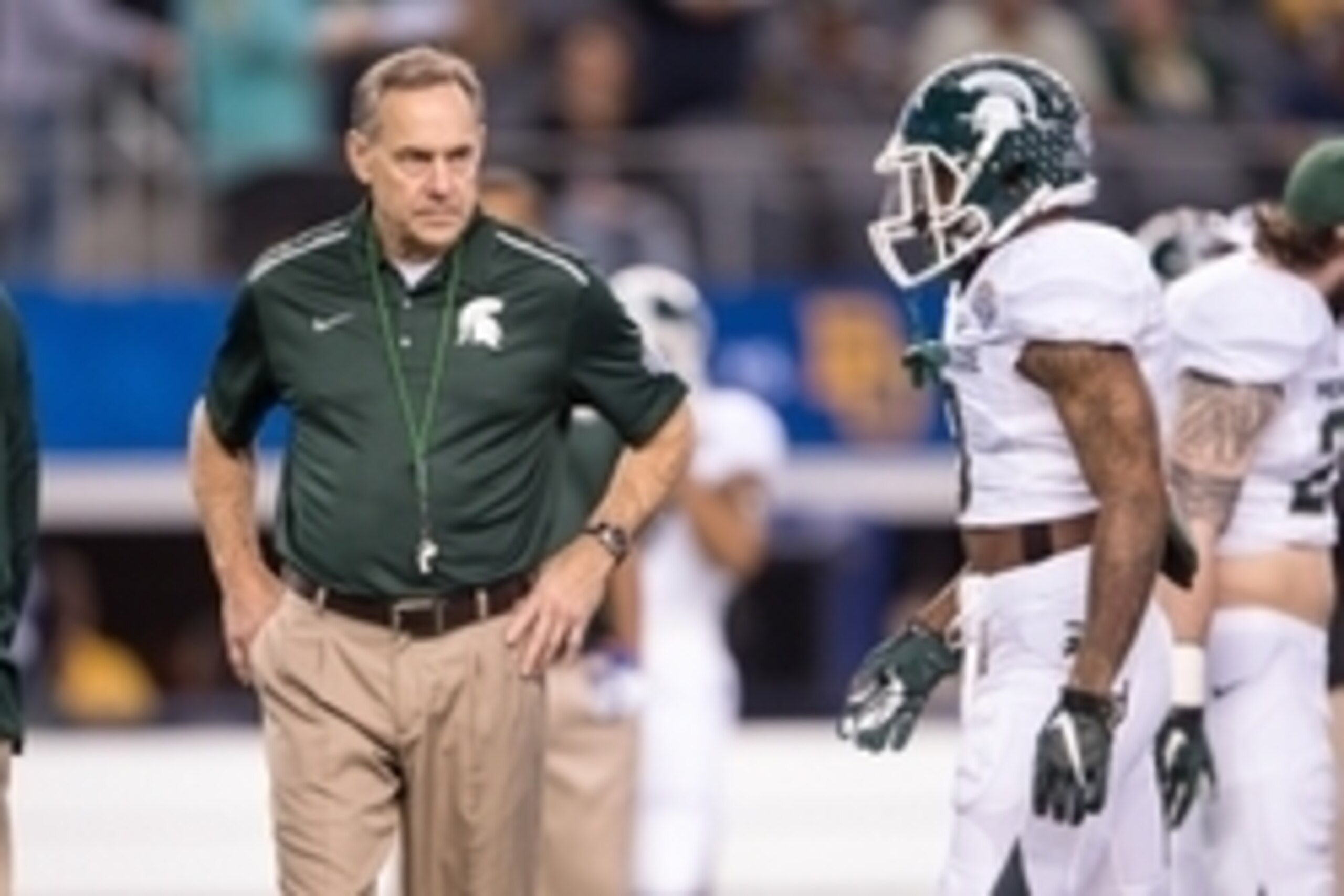 Jan 1, 2015; Arlington, TX, USA; Michigan State Spartans head coach Mark Dantonio during warmups before the game against the Baylor Bears in the 2015 Cotton Bowl Classic at AT&T Stadium. The Spartans defeated the Bears 42-41. Mandatory Credit: Jerome Miro