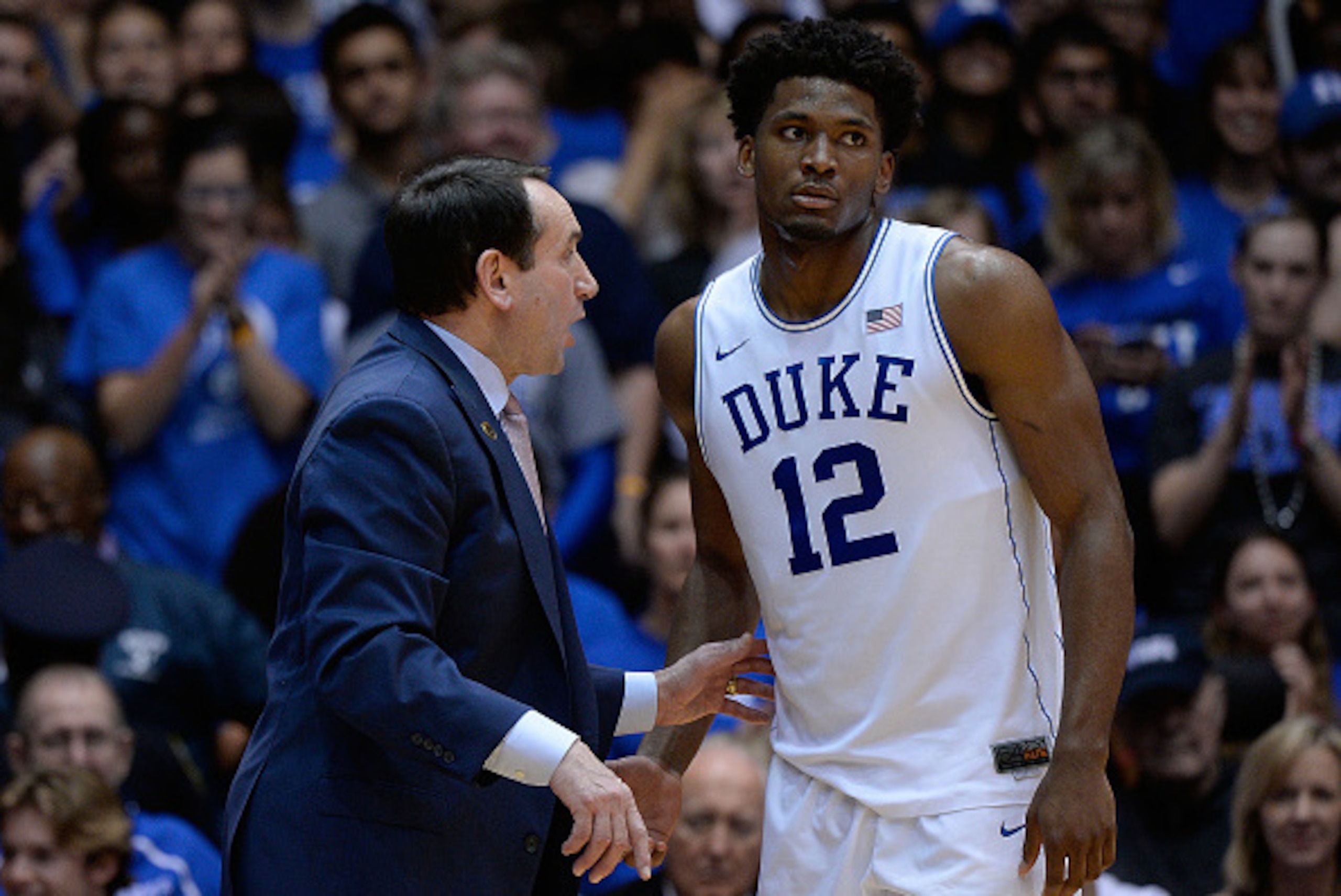DURHAM, NC - MARCH 04: Head coach Mike Krzyzewski talks with Justise Winslow #12 of the Duke Blue Devils during their game against the Wake Forest Demon Deacons at Cameron Indoor Stadium on March 4, 2015 in Durham, North Carolina. Duke won 94-51. (Photo DURHAM, NC - MARCH 04: Head coach Mike Krzyzewski talks with Justise Winslow #12 of the Duke Blue Devils during their game against the Wake Forest Demon Deacons at Cameron Indoor Stadium on March 4, 2015 in Durham, North Carolina. Duke won 94-51. (Photo