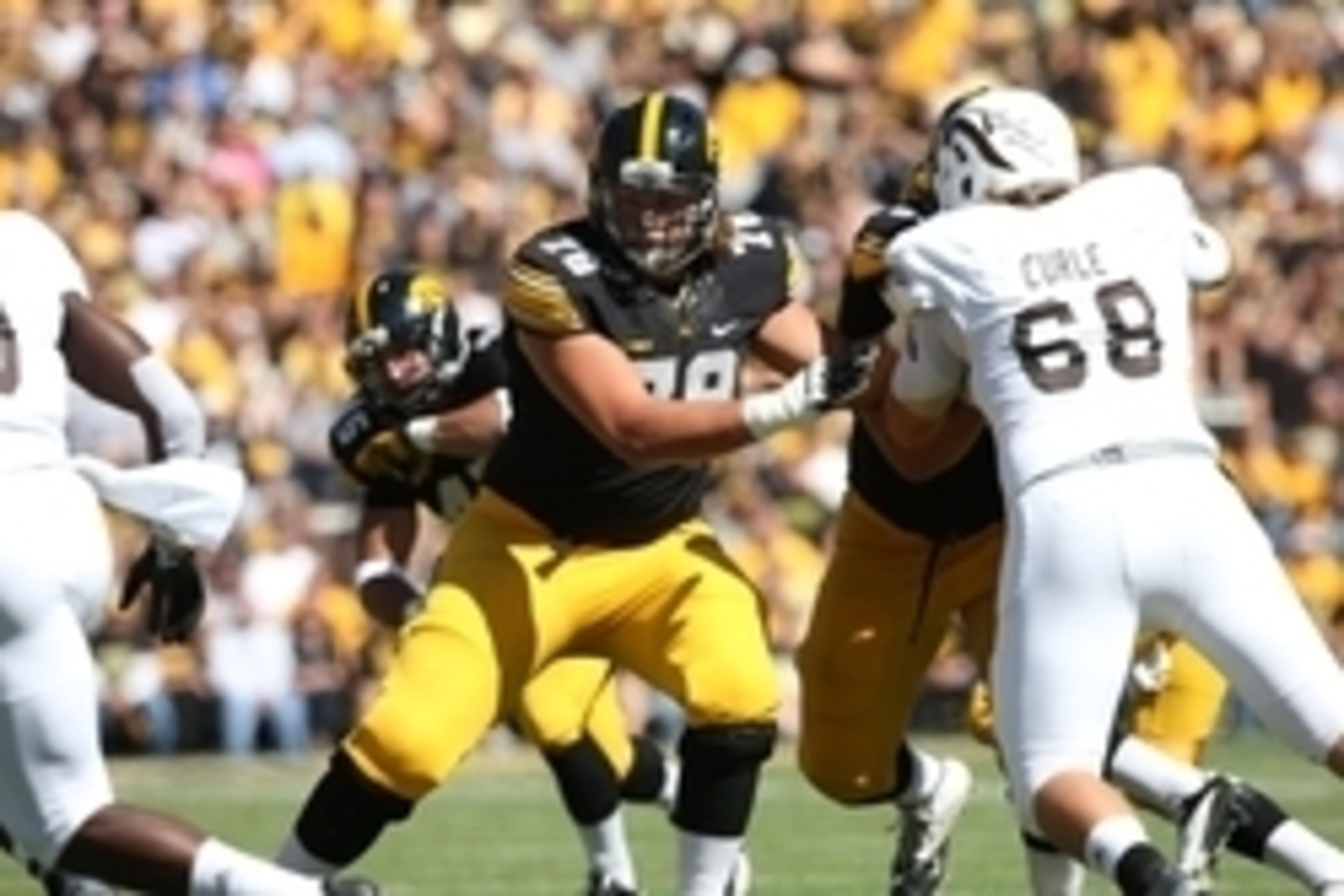 Sep 21, 2013; Iowa City, IA, USA; USA Iowa Hawkeyes guard Andrew Donnal (78) blocks against the Western Michigan Broncos during the first quarter at Kinnick Stadium. Mandatory Credit: Reese Strickland-USA TODAY Sports Sep 21, 2013; Iowa City, IA, USA; USA Iowa Hawkeyes guard Andrew Donnal (78) blocks against the Western Michigan Broncos during the first quarter at Kinnick Stadium. Mandatory Credit: Reese Strickland-USA TODAY Sports