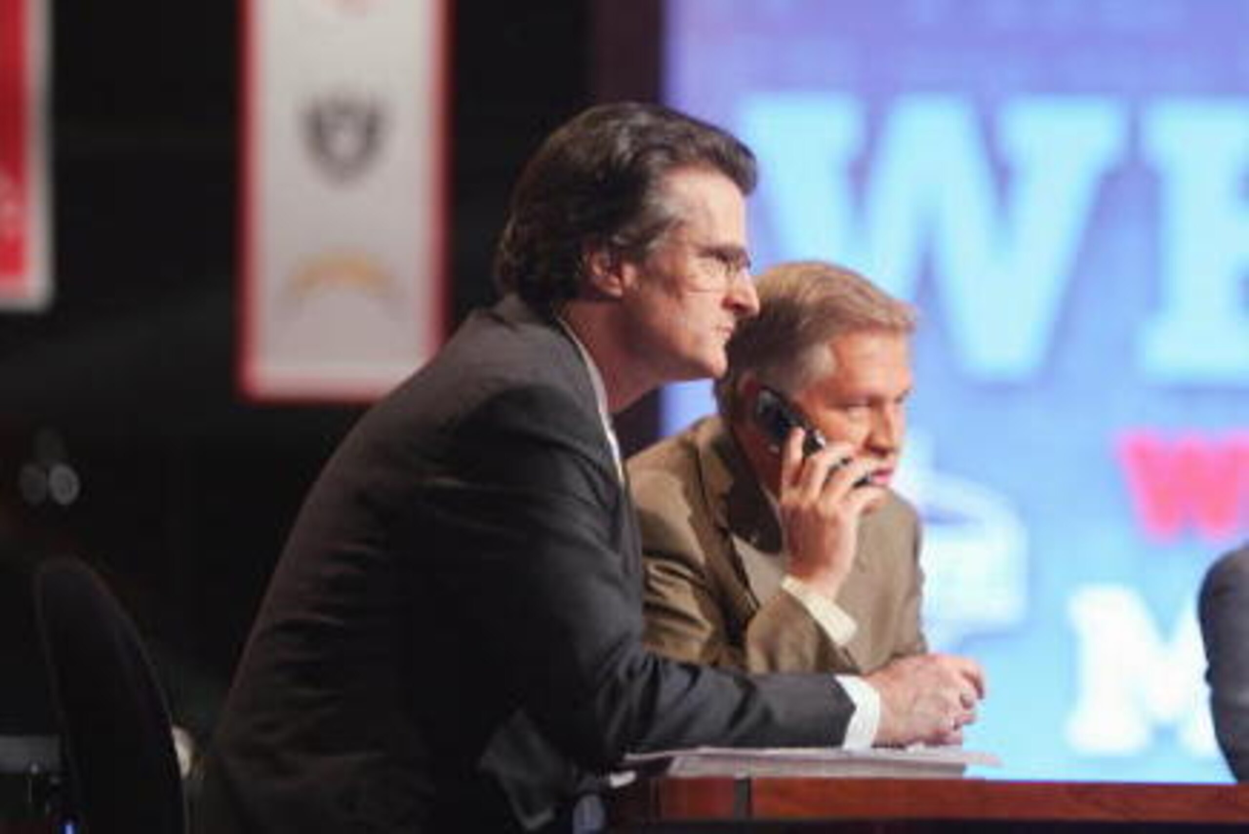 NEW YORK - APRIL 28:  Mel Kiper, Chris Mortensen and Keyshawn Johnson broadcast for ESPN during the 2007 NFL Draft on April 28, 2007 at Radio City Music Hall in New York, New York. (Photo by Chris McGrath/Getty Images)