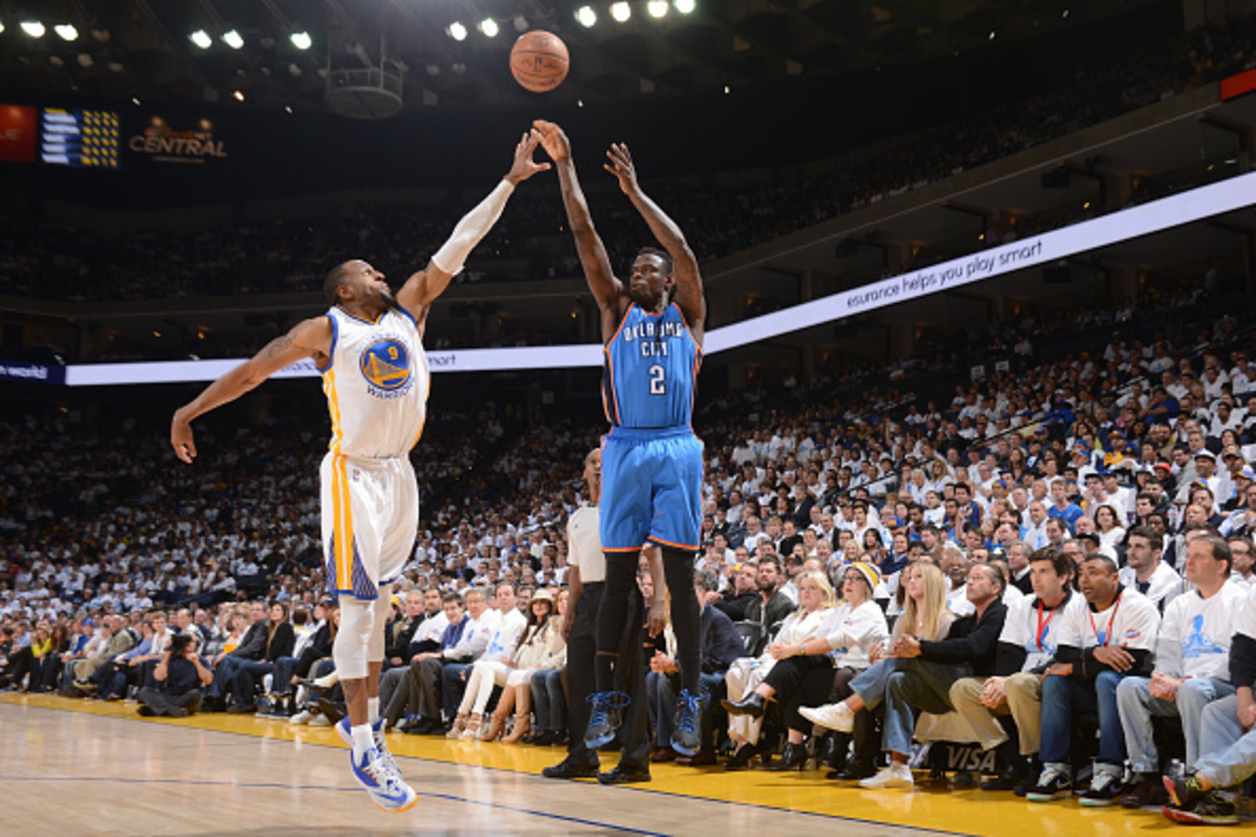 OAKLAND, CA - JANUARY 5: Anthony Morrow #2 of the Oklahoma City Thunder shoots against Andre Iguodala #9 of the Golden State Warriors on January 5, 2015 at Oracle Arena in Oakland, California. NOTE TO USER: User expressly acknowledges and agrees that, by 