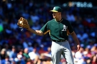 Mar 5, 2015; Mesa, AZ, USA; Oakland Athletics pitcher Pat Venditte against the Chicago Cubs during a spring training baseball game at Sloan Park. Mandatory Credit: Mark J. Rebilas-USA TODAY Sports