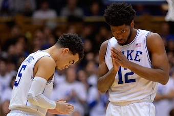 DURHAM, NC - FEBRUARY 04: Tyus Jones #5 and Justise Winslow #12 of the Duke Blue Devils bow to each other before the start of their game against the Georgia Tech Yellow Jackets at Cameron Indoor Stadium on February 4, 2015 in Durham, North Carolina. (Phot