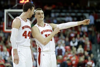 MADISON, WI - FEBRUARY 03:  Sam Dekker #15 of the Wisconsin Badgers talks to Frank Kaminsky #44 during the second half against the Indiana Hoosiers at Kohl Center on February 03, 2015 in Madison, Wisconsin. (Photo by Mike McGinnis/Getty Images)