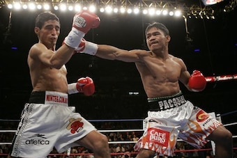 Pacquiao went 2-1 versus Morales.